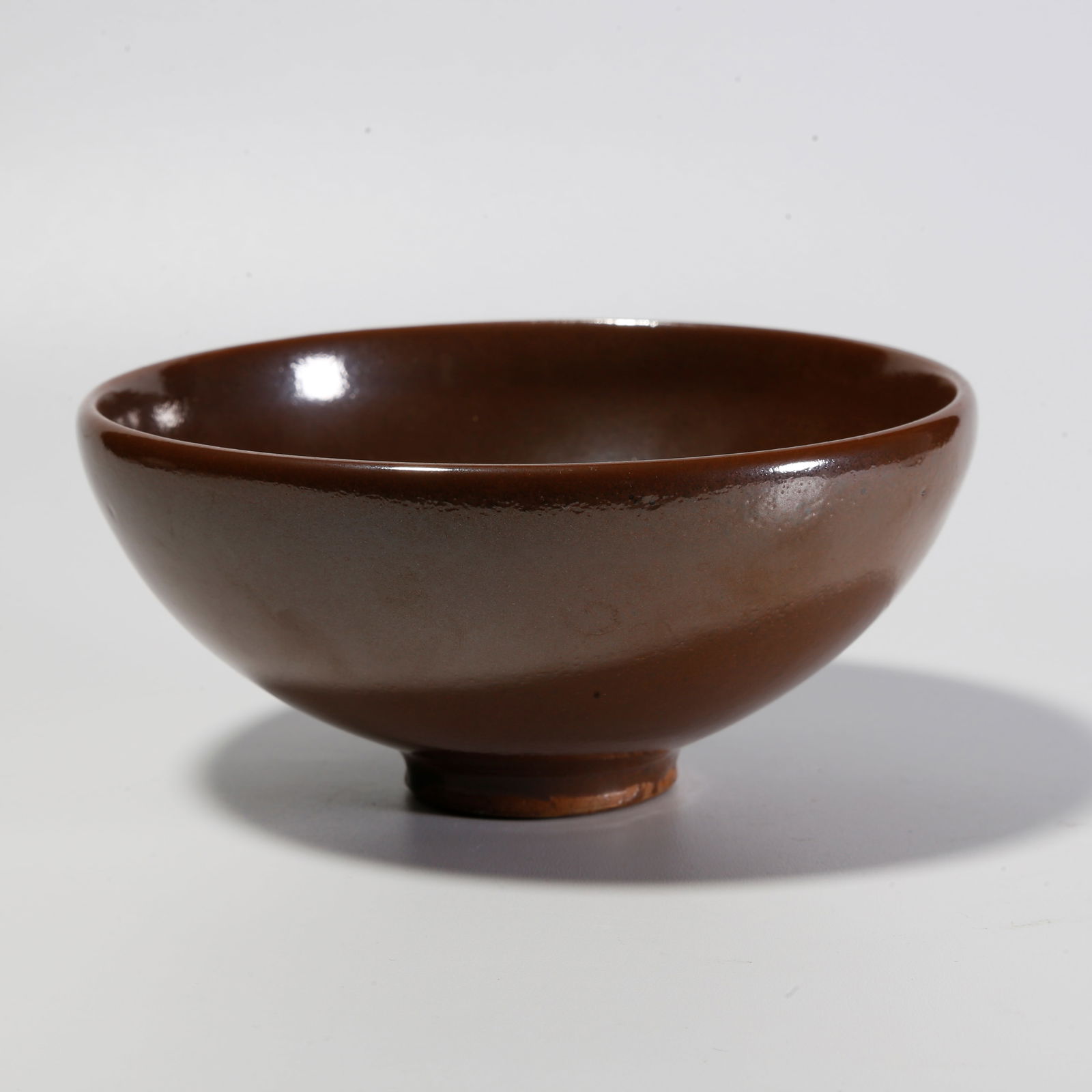 A PURPLE-GOLD GLAZED BOWL: Purple-gold glazed bowl