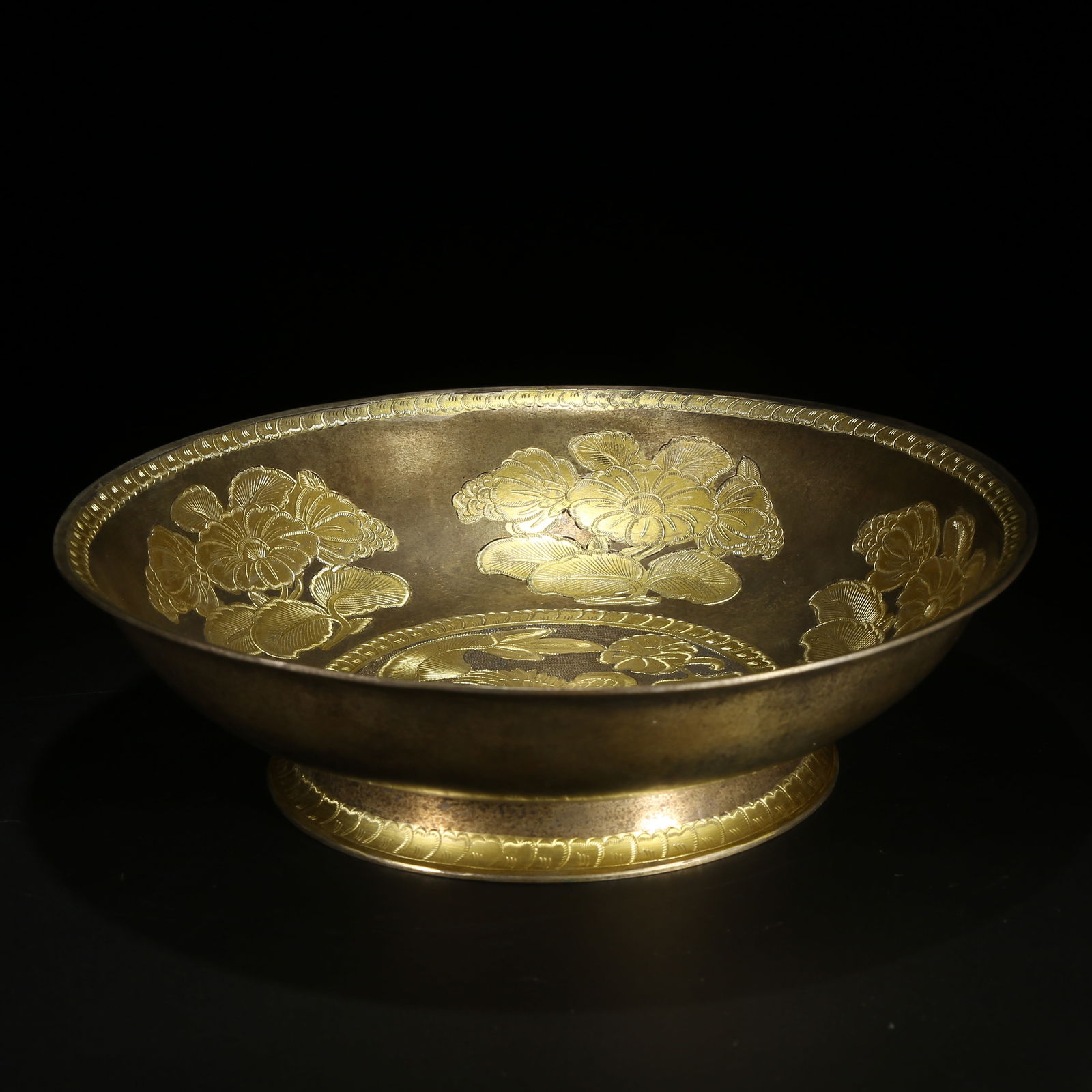 A BRONZE PARTIAL GILDED BOWL WITH FLORAL AND BIRD PATTERN: Bronze Partial Gilded Bowl with Floral and Bird Pattern
