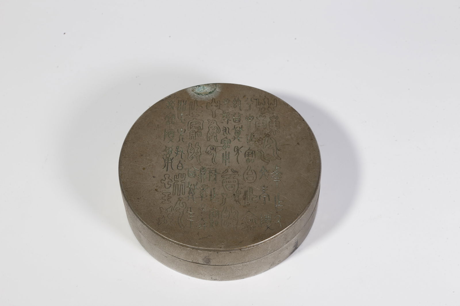 A BRONZE COVERED BOX: Bronze covered box