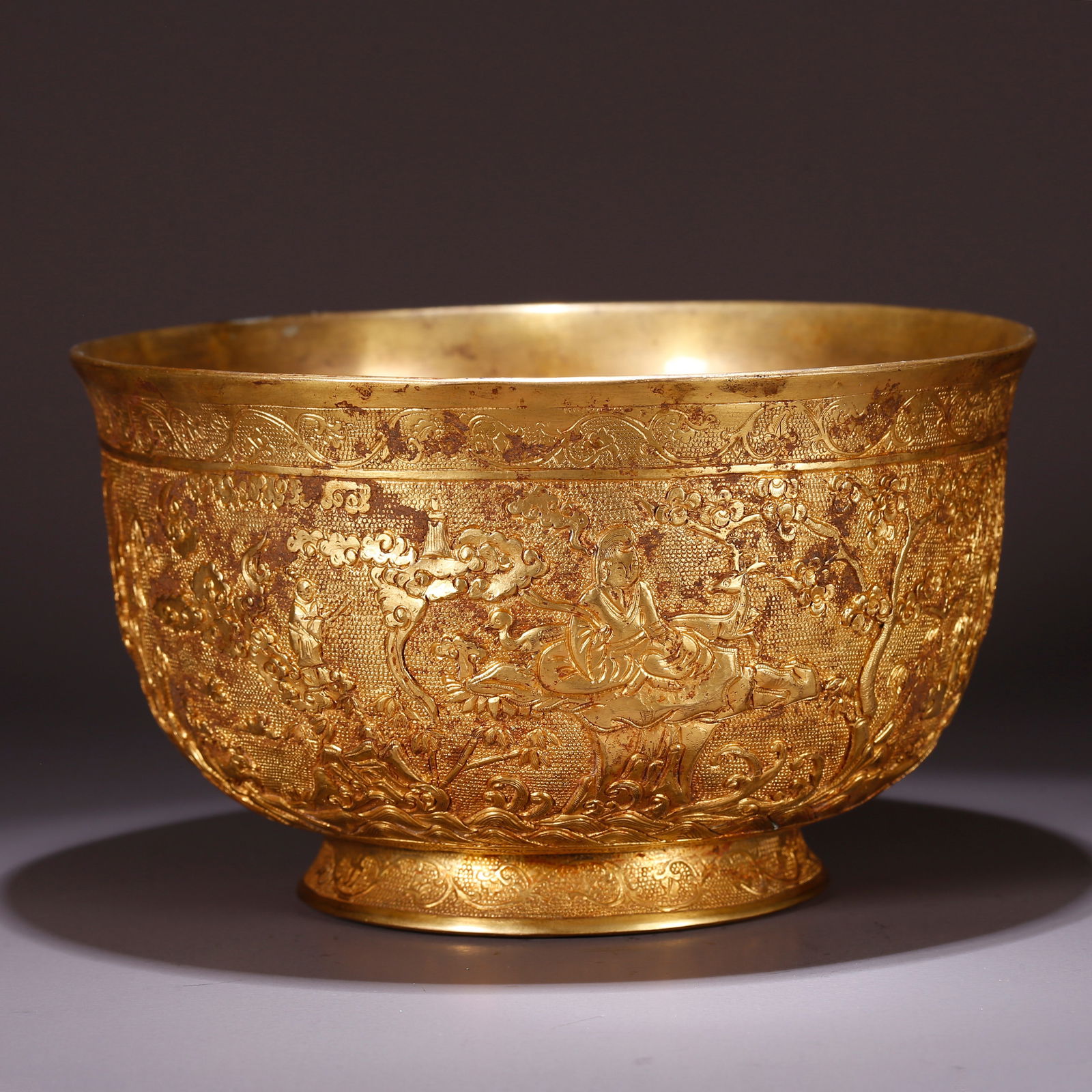 A GILT BRONZE BOWL WITH NARRATIVE FIGURES: Gilt Bronze Bowl with Narrative Figures