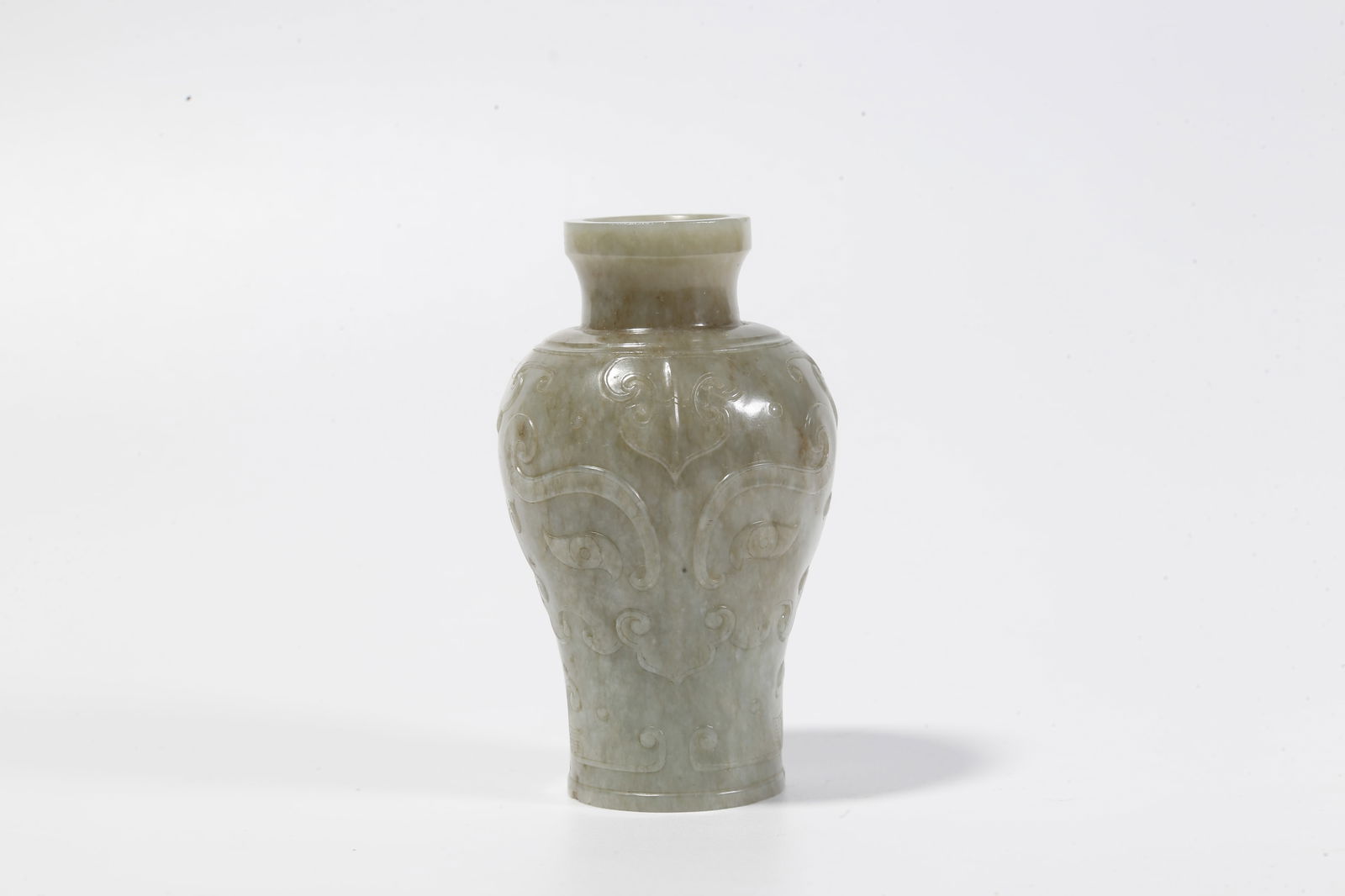 A HETIAN JADE BEAST-FACE PATTERNED VASE (1 of 9)