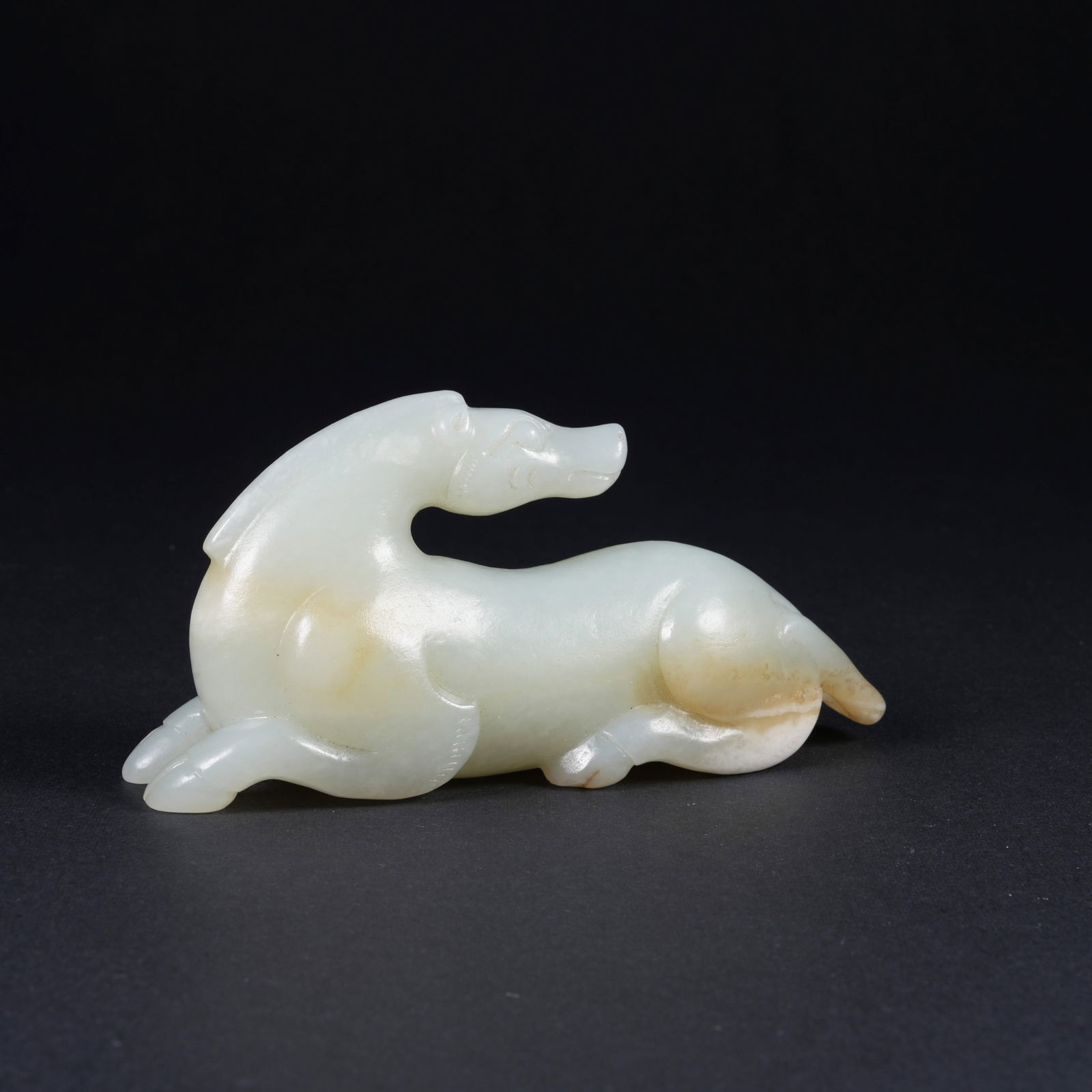A HETIAN JADE MYTHICAL-BEAST PENDANT (1 of 9)