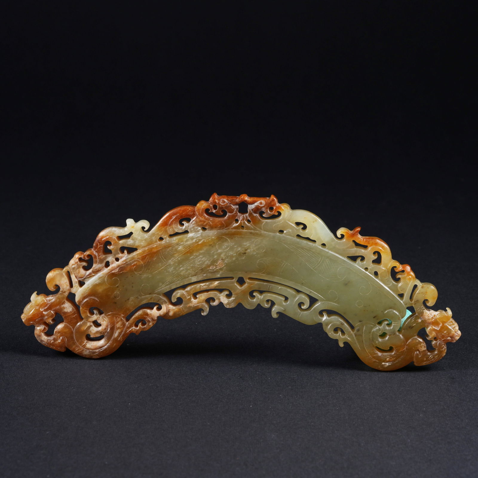 A ANCIENT JADE PENDANT WITH DRAGON MOTIF: Ancient jade pendant with dragon motif