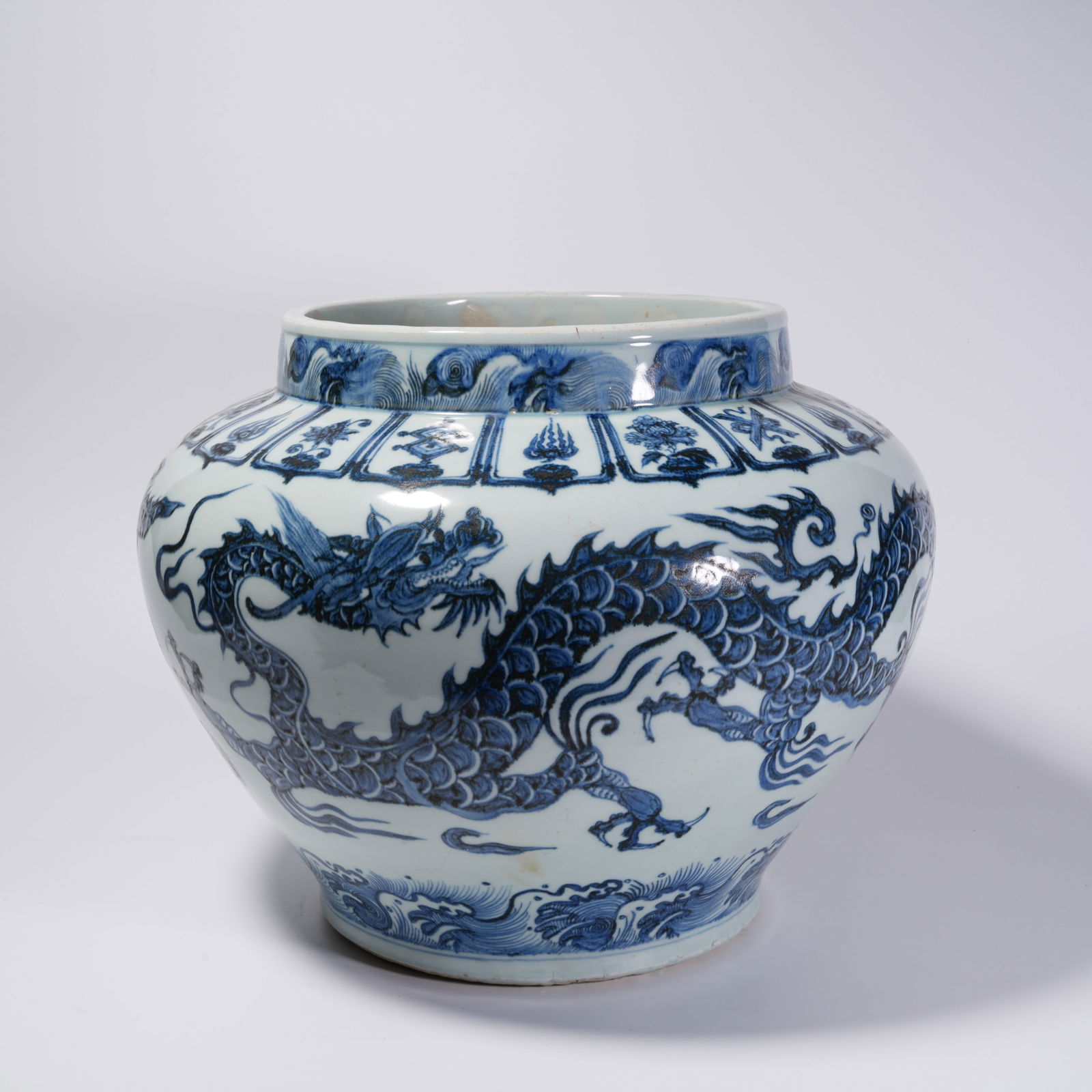 A BLUE-AND-WHITE SEAWATER DRAGON MOTIF JAR (1 of 8)