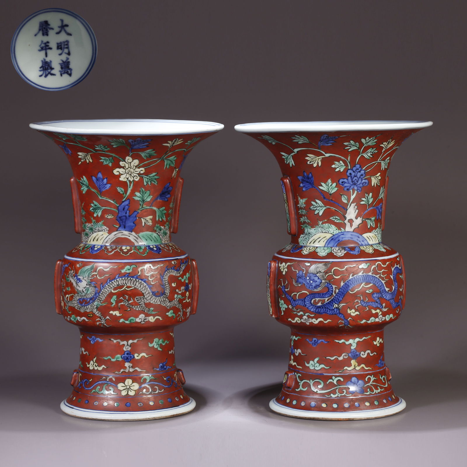 A RED-GLAZED CLOUD AND DRAGON PATTERN HU VASE (PAIR): Red-Glazed Cloud and Dragon Pattern Hu Vase (Pair)