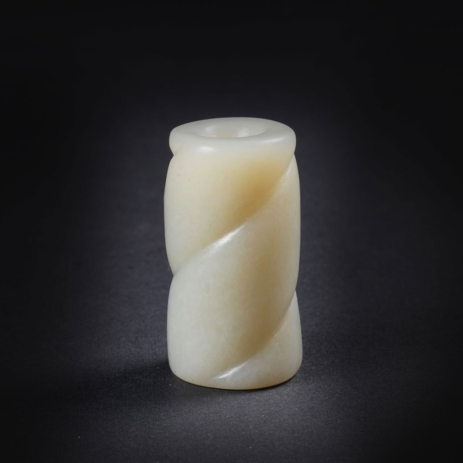 A HETIAN JADE TOGGLE: Hetian jade toggle