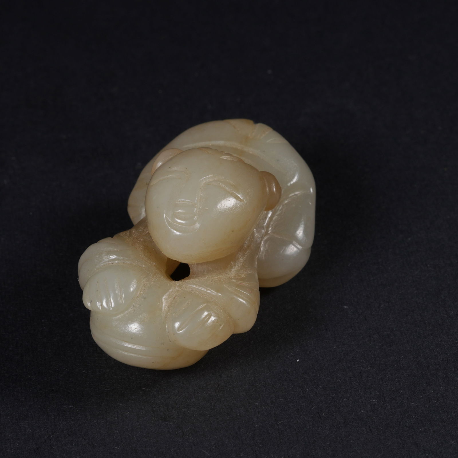 A HETIAN JADE BOY PENDANT (1 of 9)