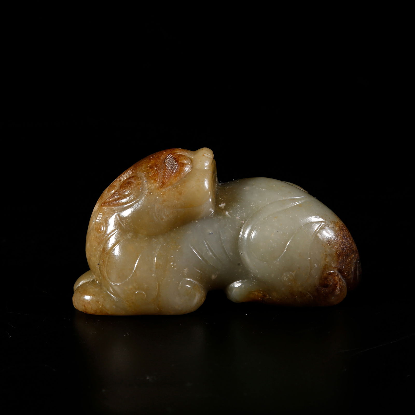 A HETIAN JADE TIGER-SHAPED ORNAMENT (1 of 10)