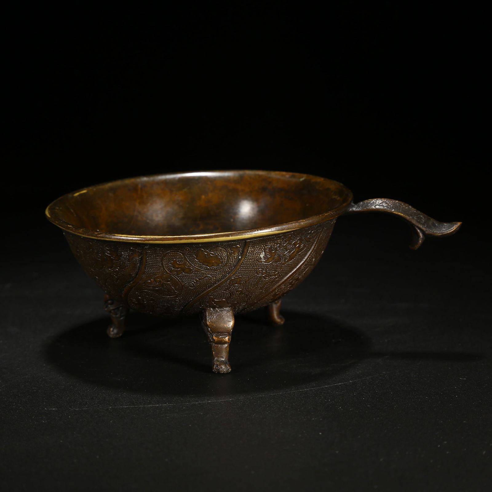 A BRONZE CUP WITH BEAST PATTERN: Bronze Cup with Beast Pattern