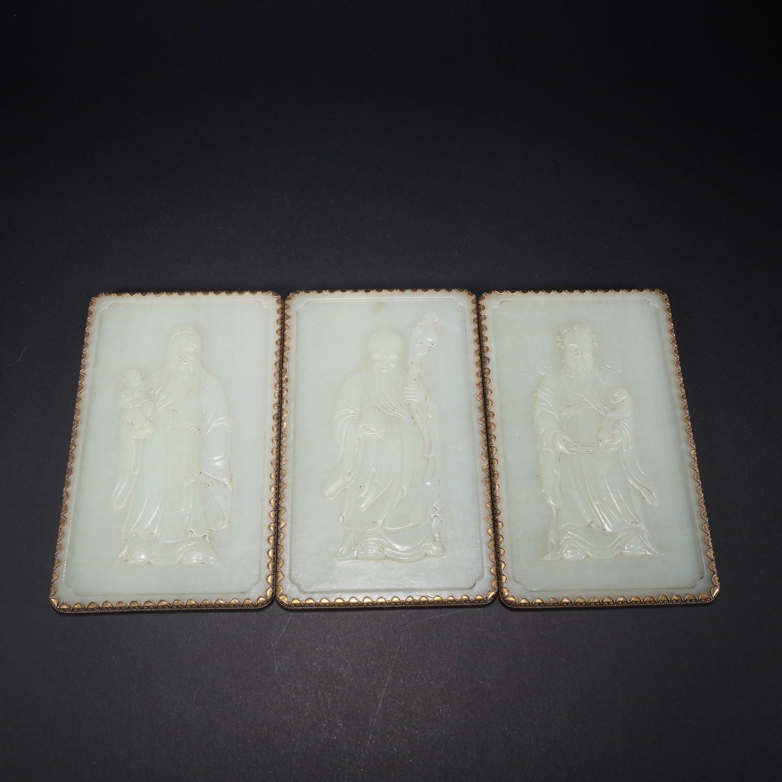 A HETIAN JADE SET OF FULU SHOU (BLESSING, PROSPERITY, LONGEVITY) JADE PLAQUES WITH GOLD TRIM: Hetian Jade Set of Fulu Shou (Blessing, Prosperity, Longevity) Jade Plaques with Gold Trim