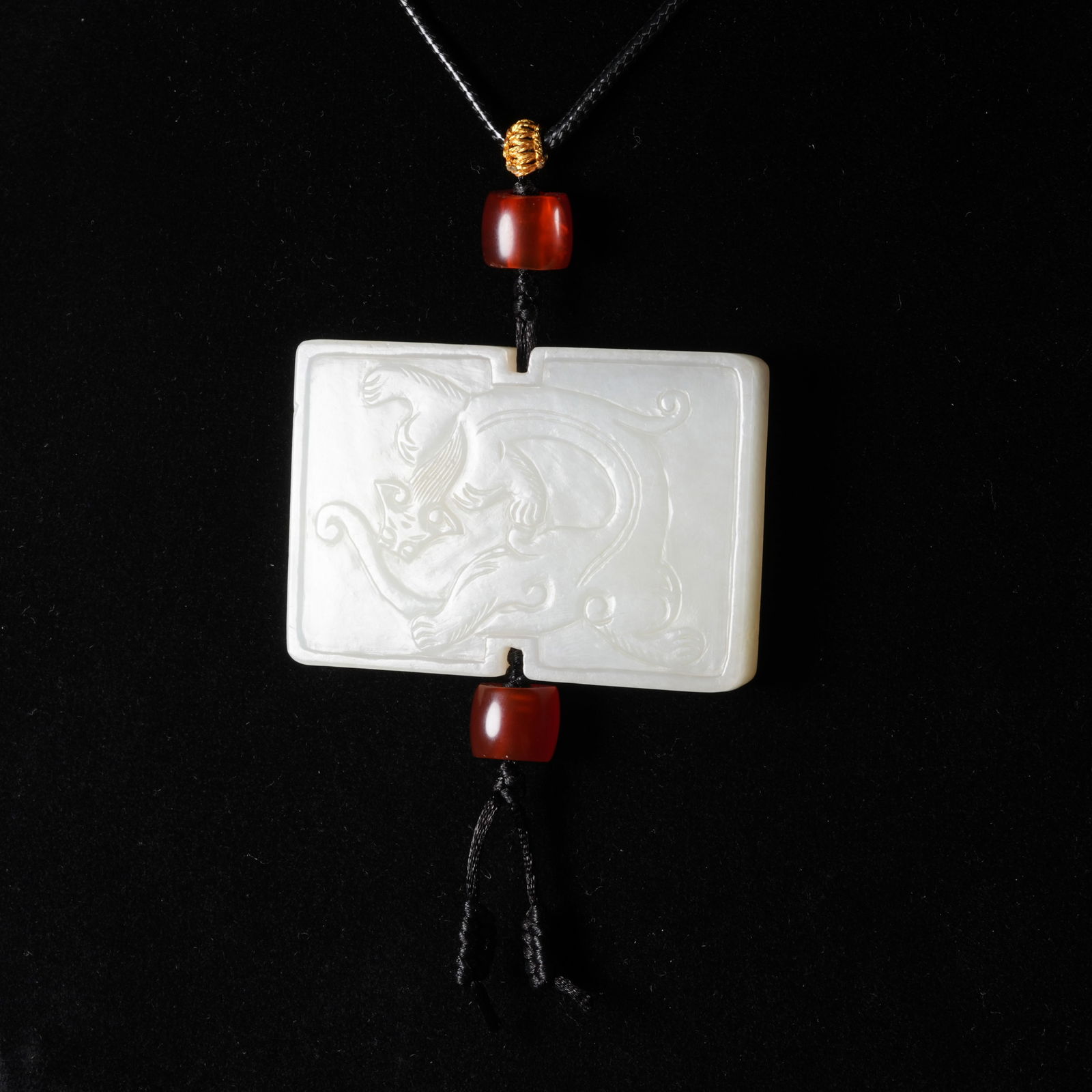 A HETIAN JADE PLAQUE WITH CHI DRAGON MOTIF (1 of 7)