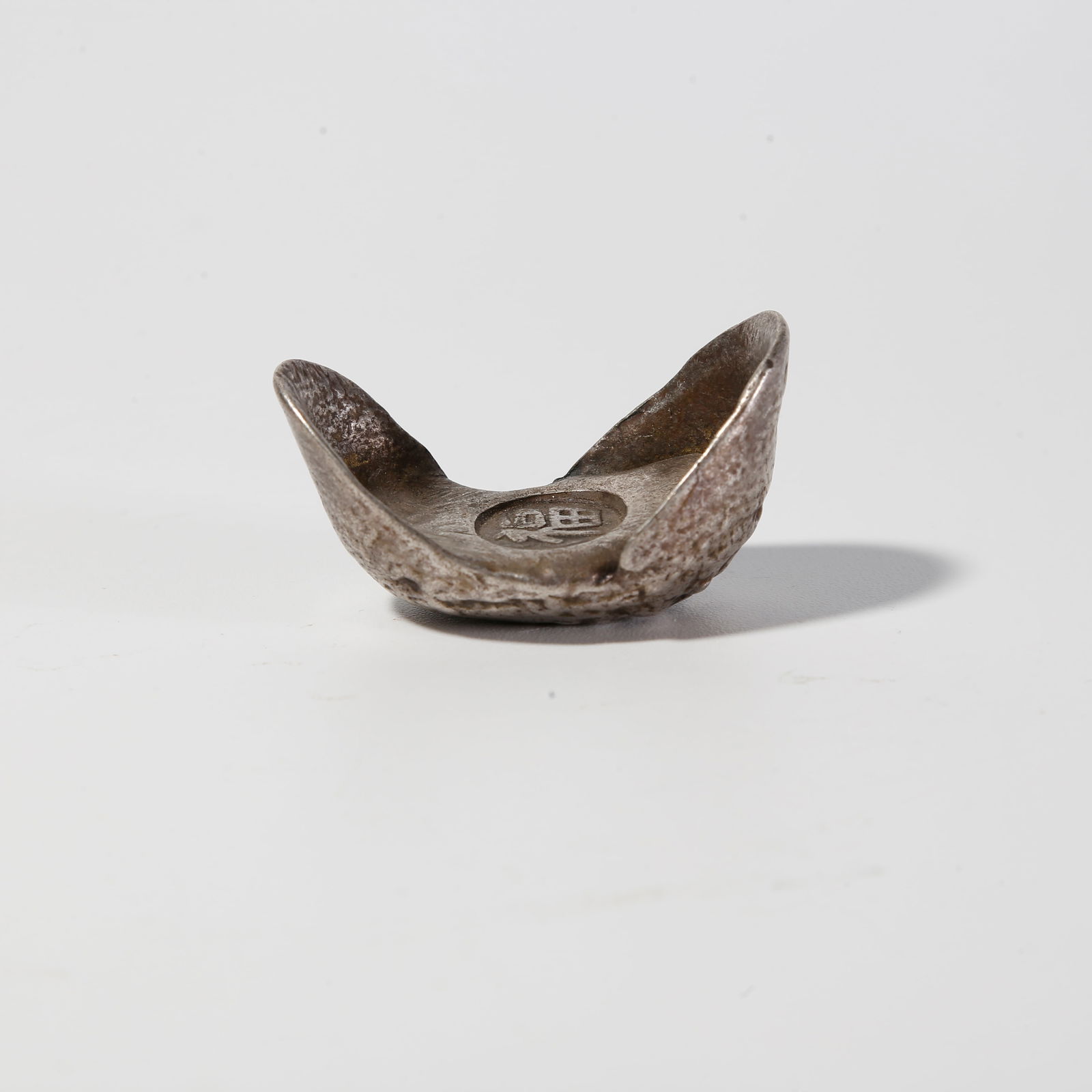 A SILVER SYCEE (ONE PIECE): Silver sycee (one piece)