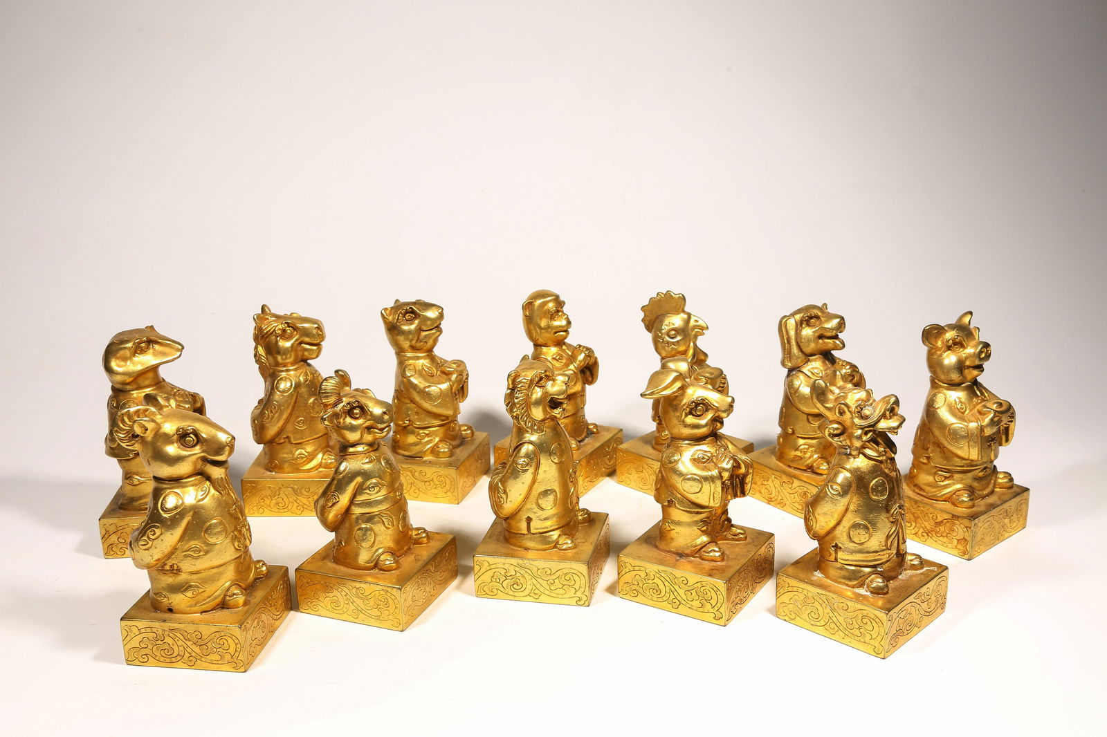 A GILDED BRONZE SEAL SET WITH TWELVE ZODIAC KNOBS - 7