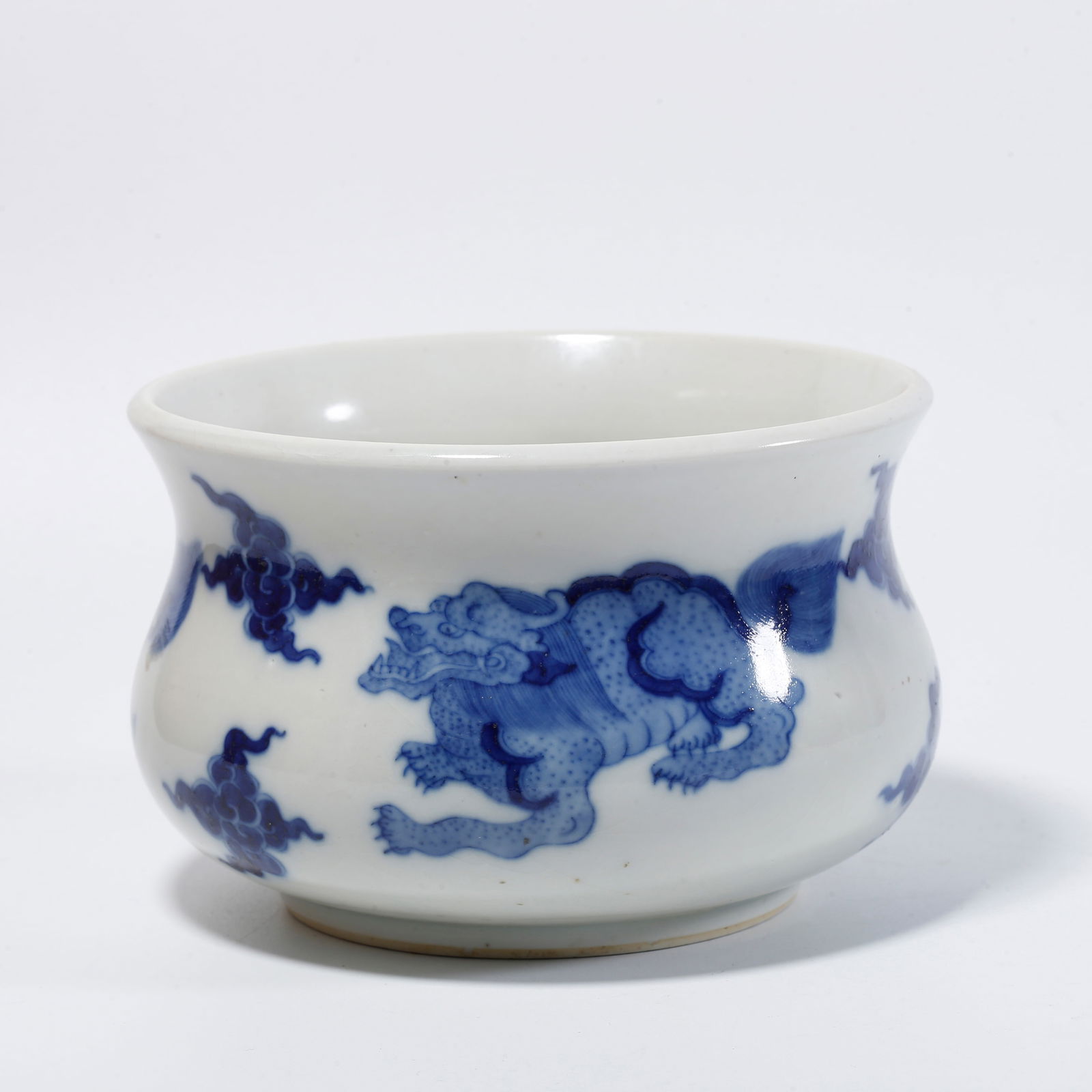 A BLUE AND WHITE BRUSH WASHER WITH QILIN DESIGN: Blue and white brush washer with qilin design