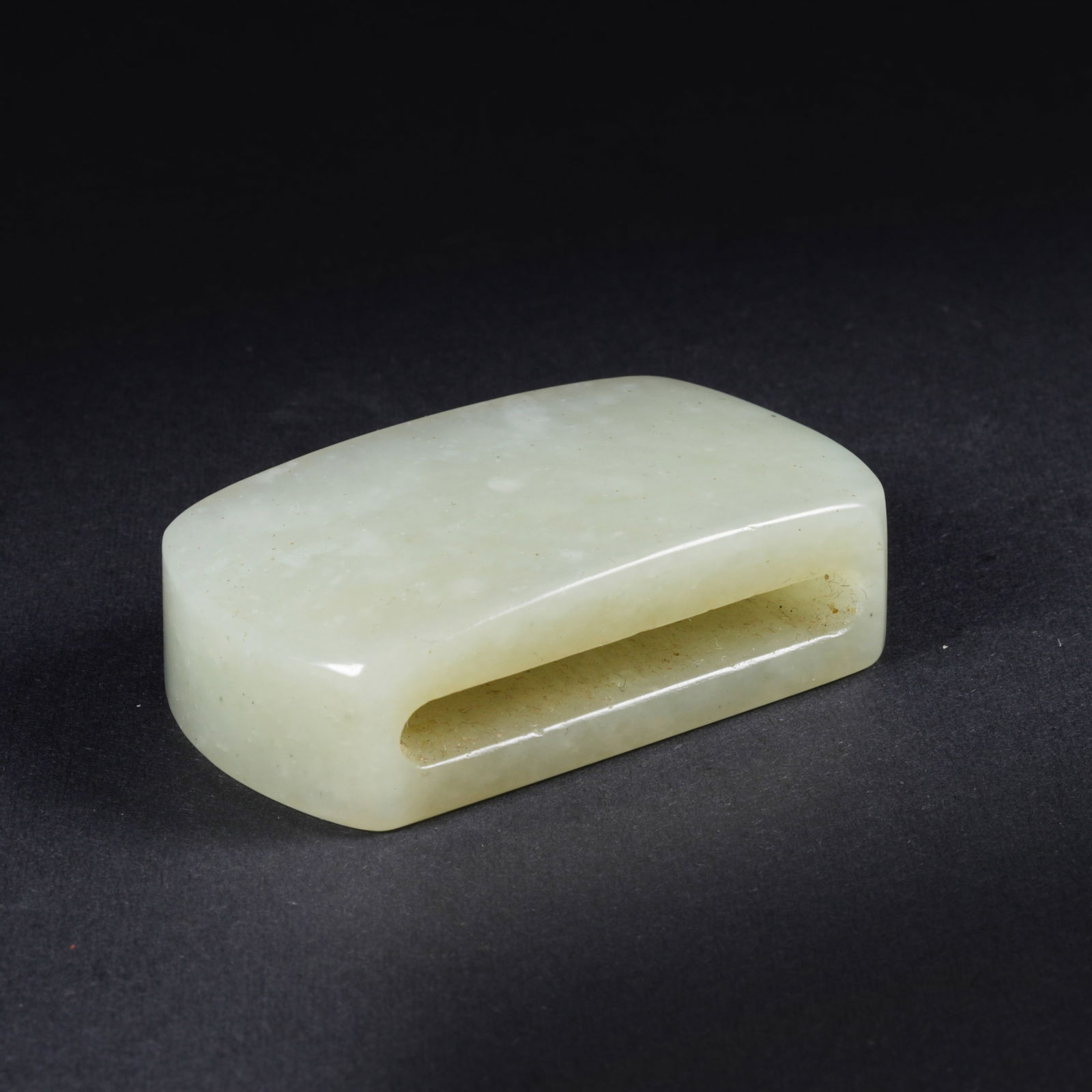 A HETIAN JADE SWORD-SHAPED PENDANT (JIANLIANG): Hetian jade sword-shaped pendant (jianliang)