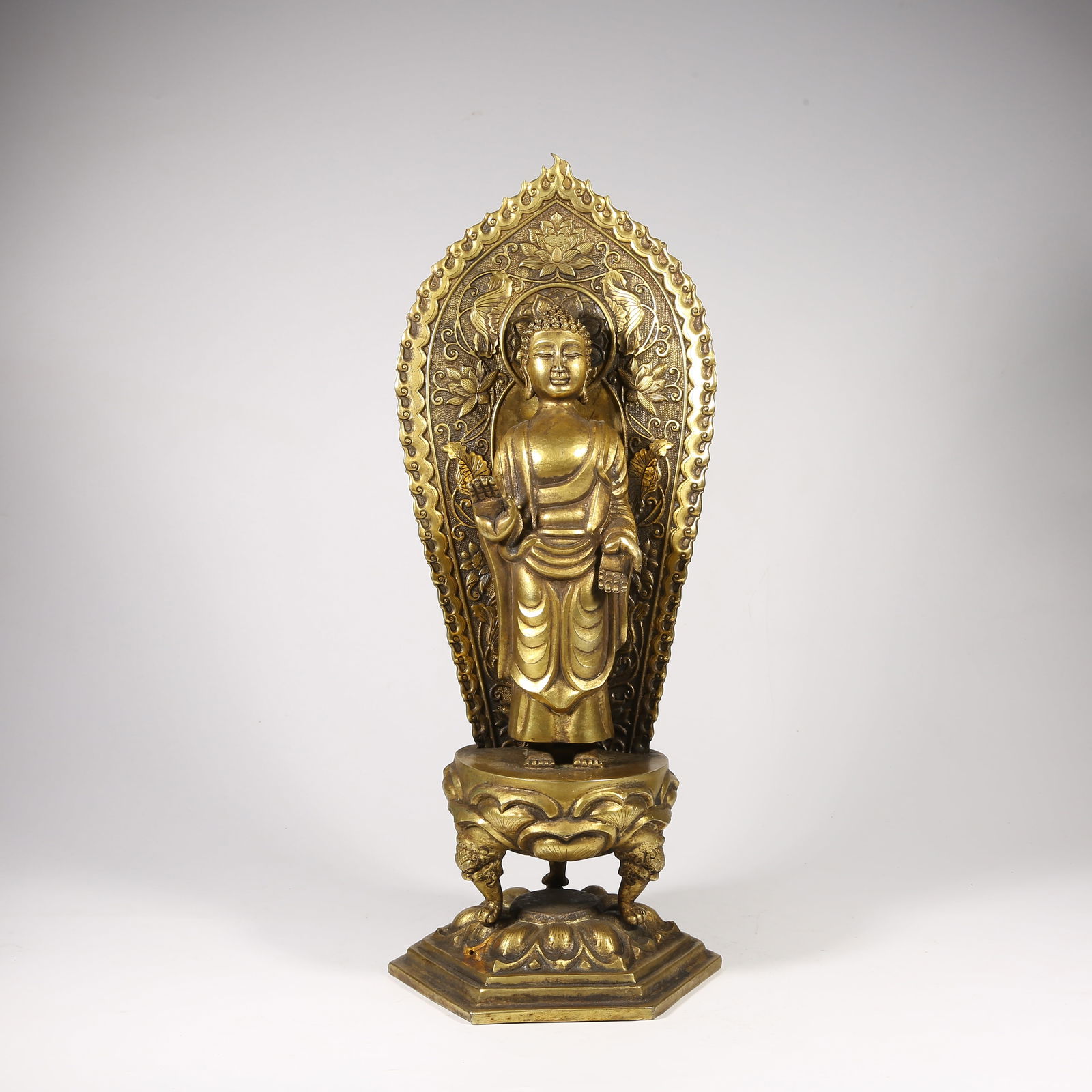 A GILDED BRONZE SHAKYAMUNI BUDDHA STATUE (1 of 8)