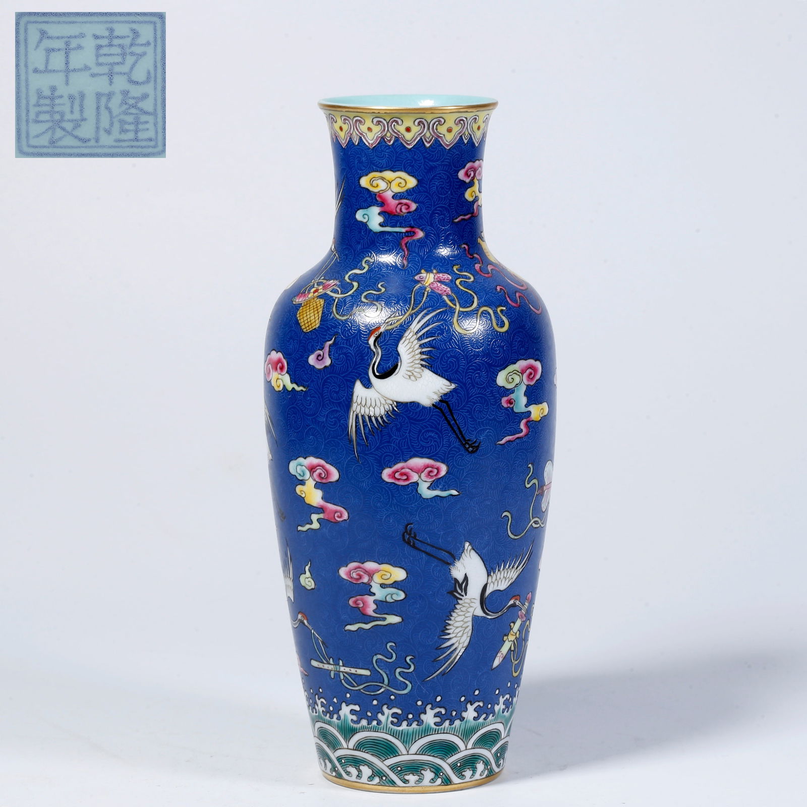 A BLUE-GLAZED VASE WITH CRANE DESIGN: Blue-glazed vase with crane design