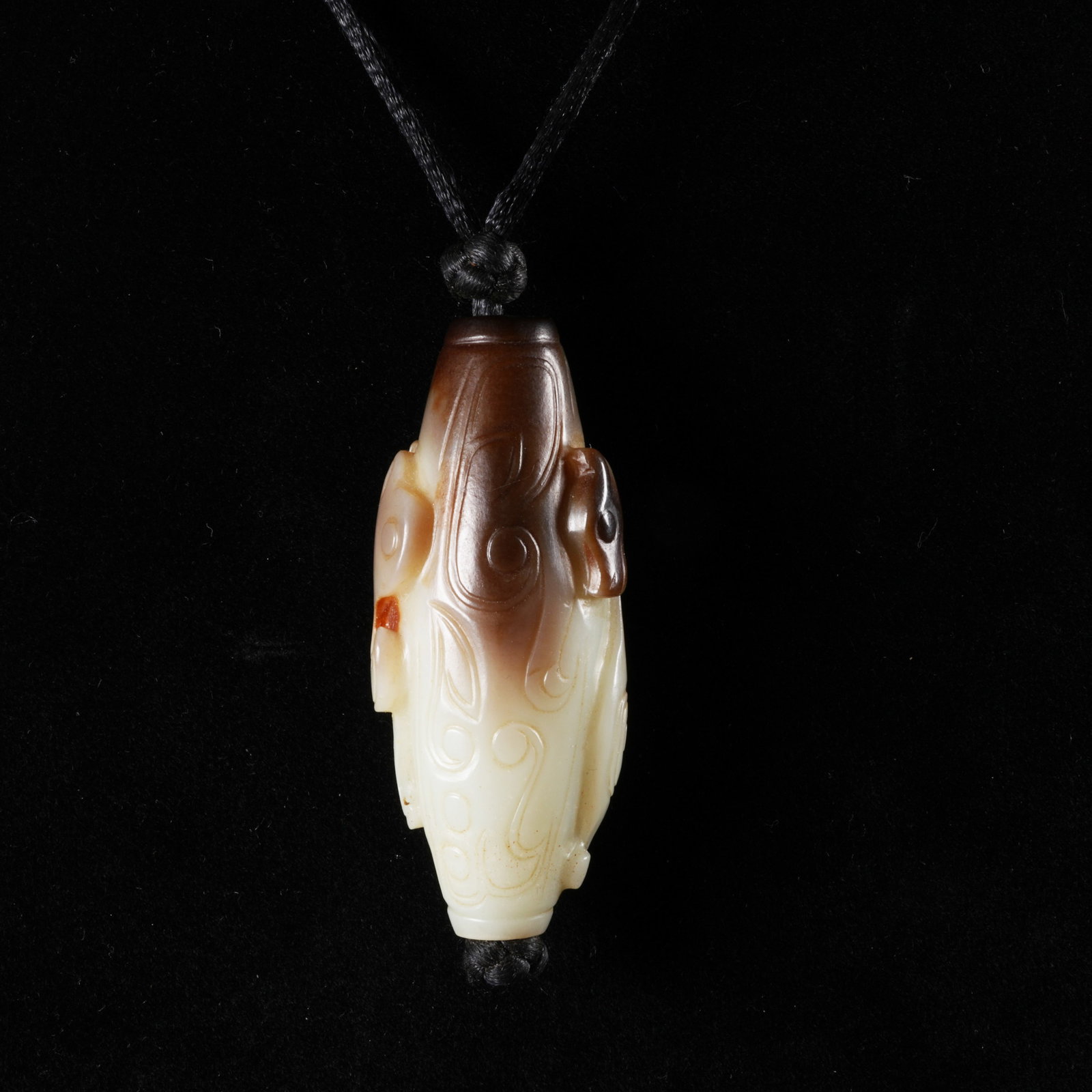 A HETIAN JADE PENDANT WITH MYTHICAL-BEAST MOTIF (1 of 7)