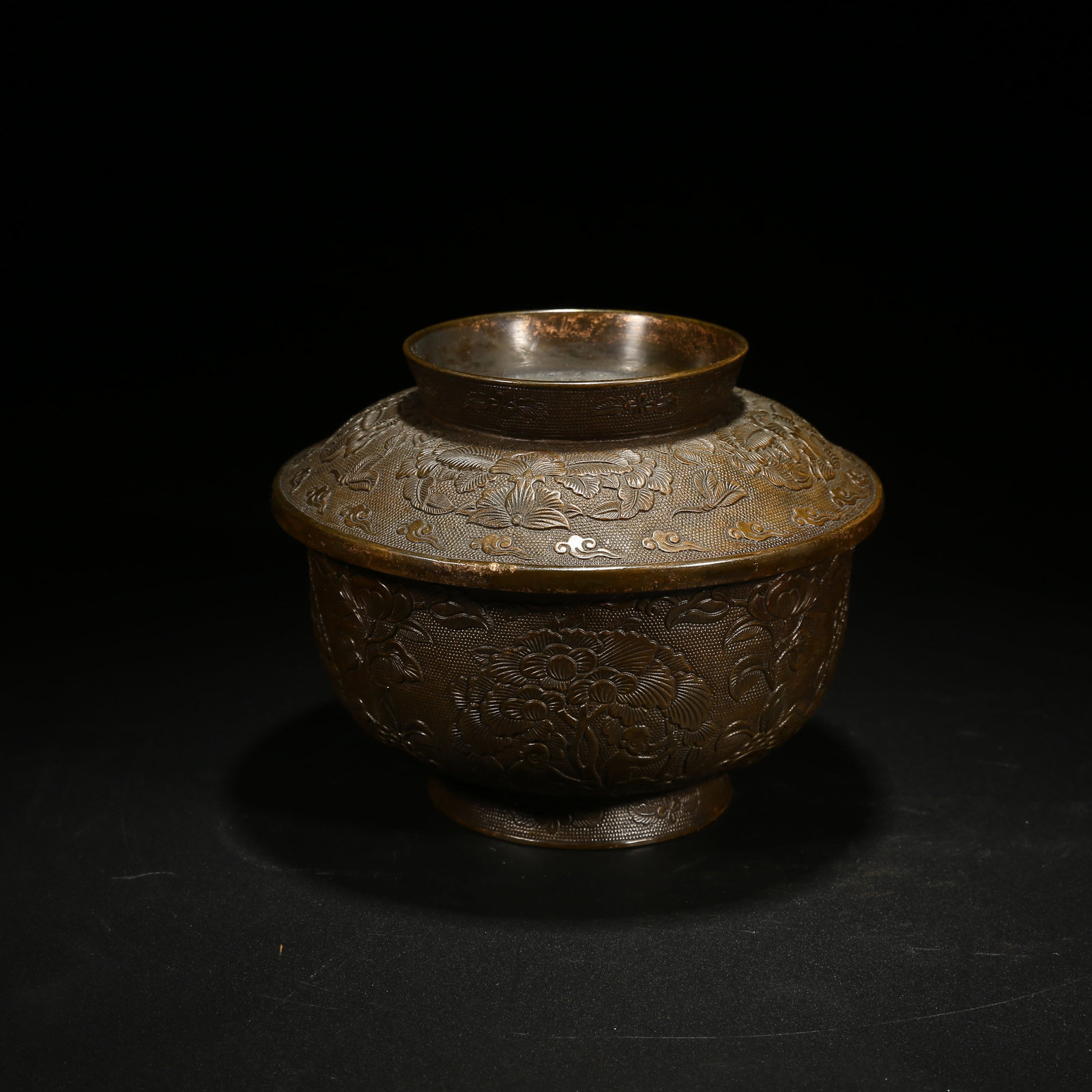 A BRONZE COVERED BOWL WITH FLORAL PATTERN: Bronze Covered Bowl with Floral Pattern