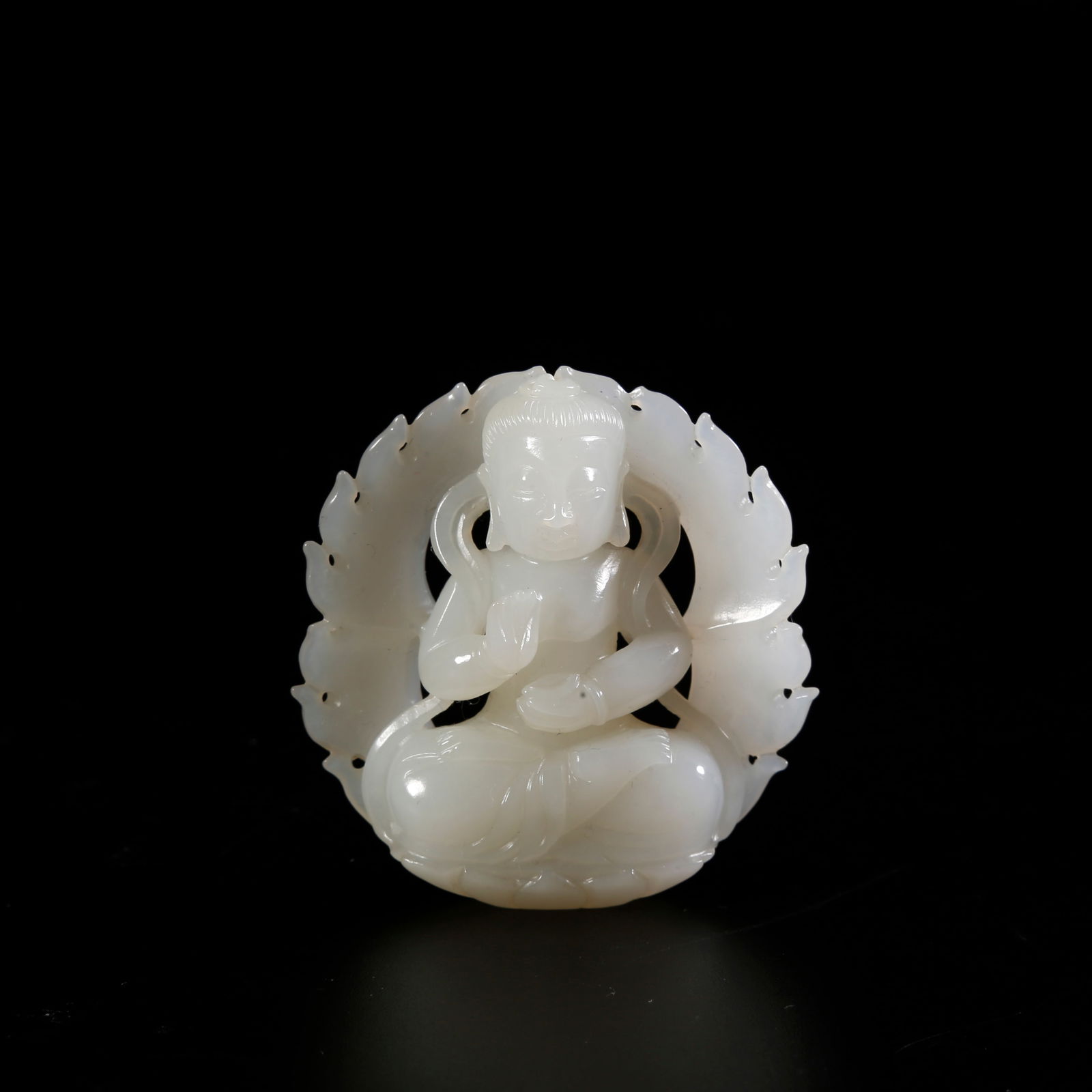 A HETIAN JADE BUDDHA STATUE: Hetian jade Buddha statue