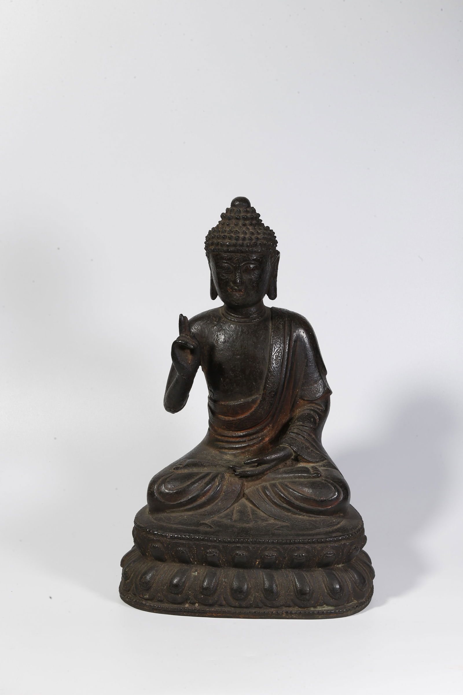 A BRONZE SHAKYAMUNI BUDDHA STATUE (1 of 9)