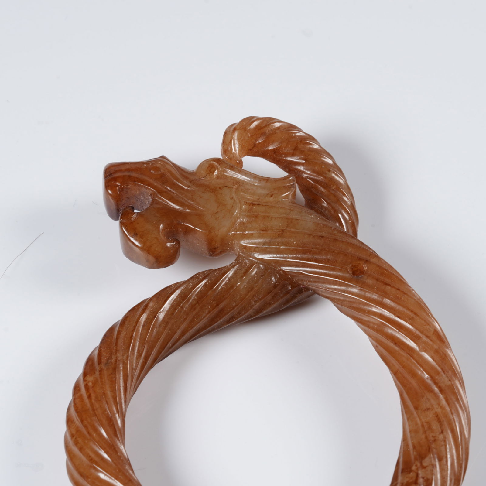 A ANCIENT JADE DRAGON-SHAPED RING - 6