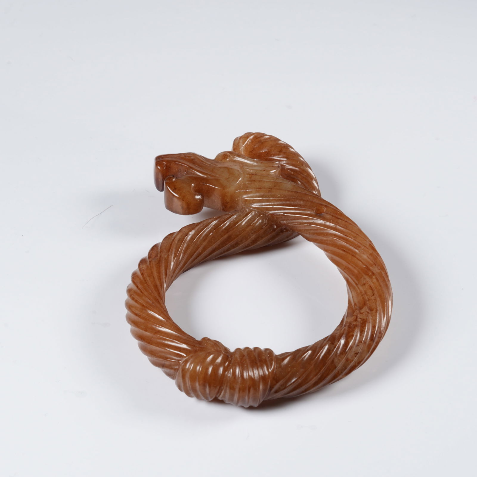 A ANCIENT JADE DRAGON-SHAPED RING - 7