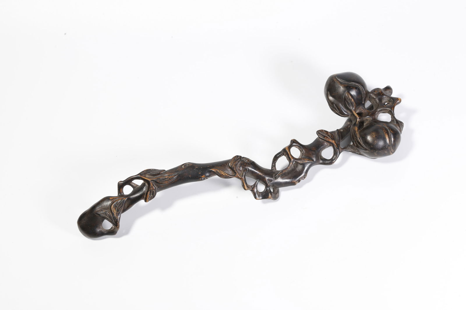 A WOODEN RUYI WITH PEACH MOTIF: Wooden ruyi with peach motif