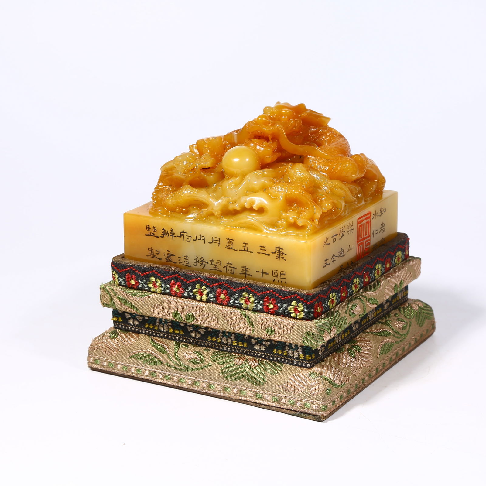 A SHOUSHAN TIANHUANG STONE SEAL WITH DRAGON KNOB: Shoushan Tianhuang stone seal with dragon knob