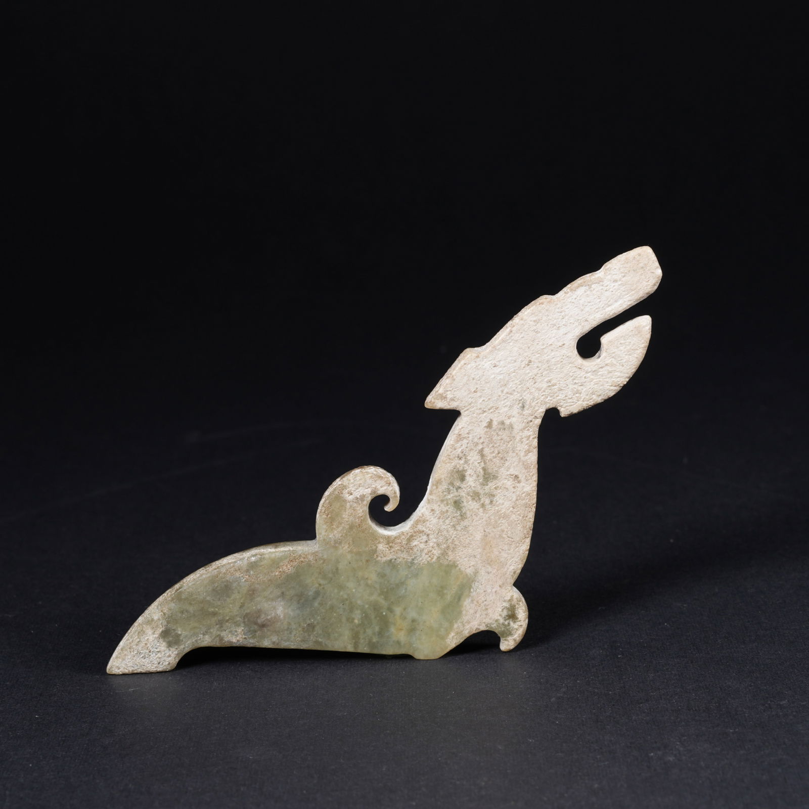 A ANCIENT JADE DRAGON-SHAPED PENDANT: Ancient jade dragon-shaped pendant