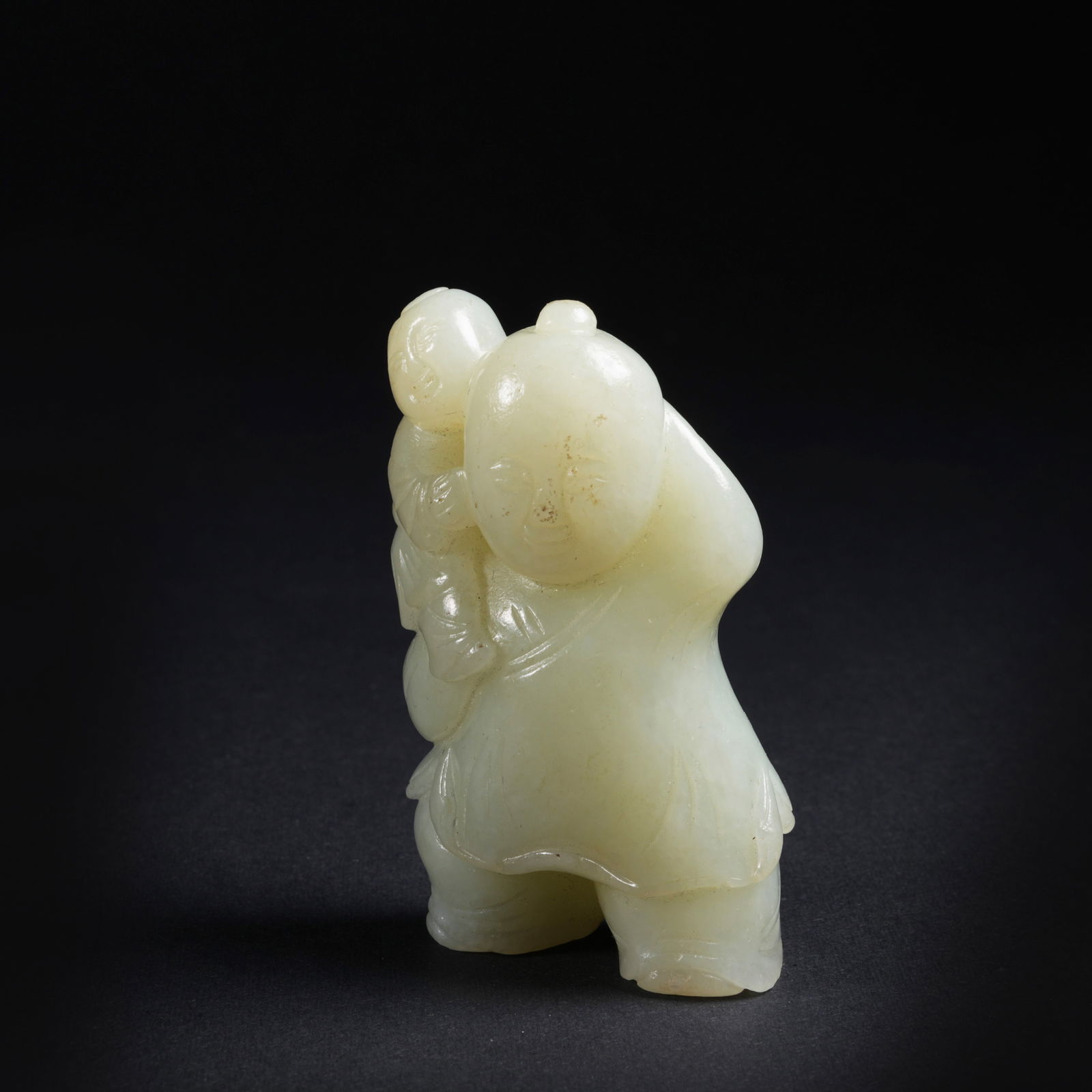 A HETIAN JADE FIGURE PENDANT (1 of 7)