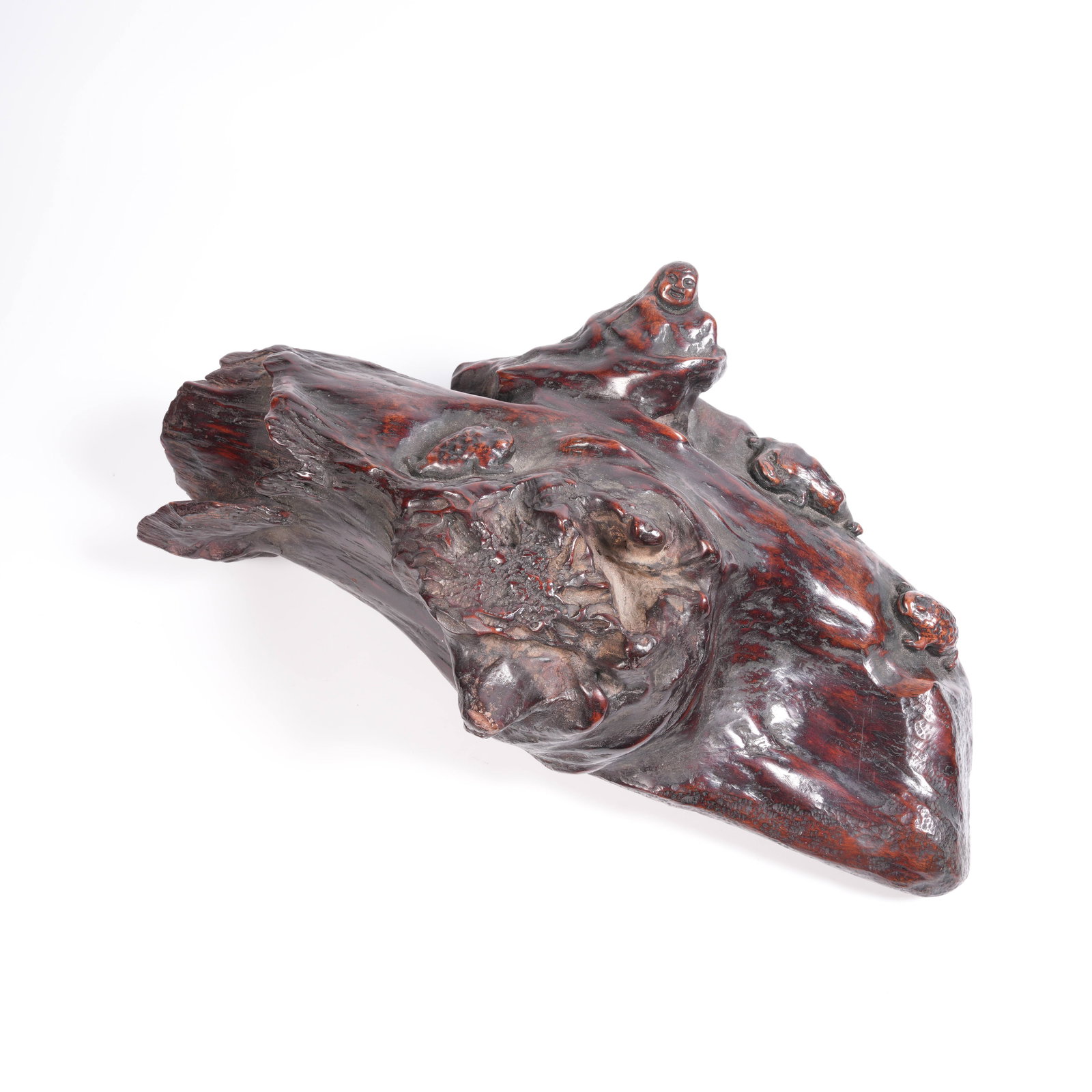 A QINAN NATURAL-FORM FIGURINE (1 of 8)