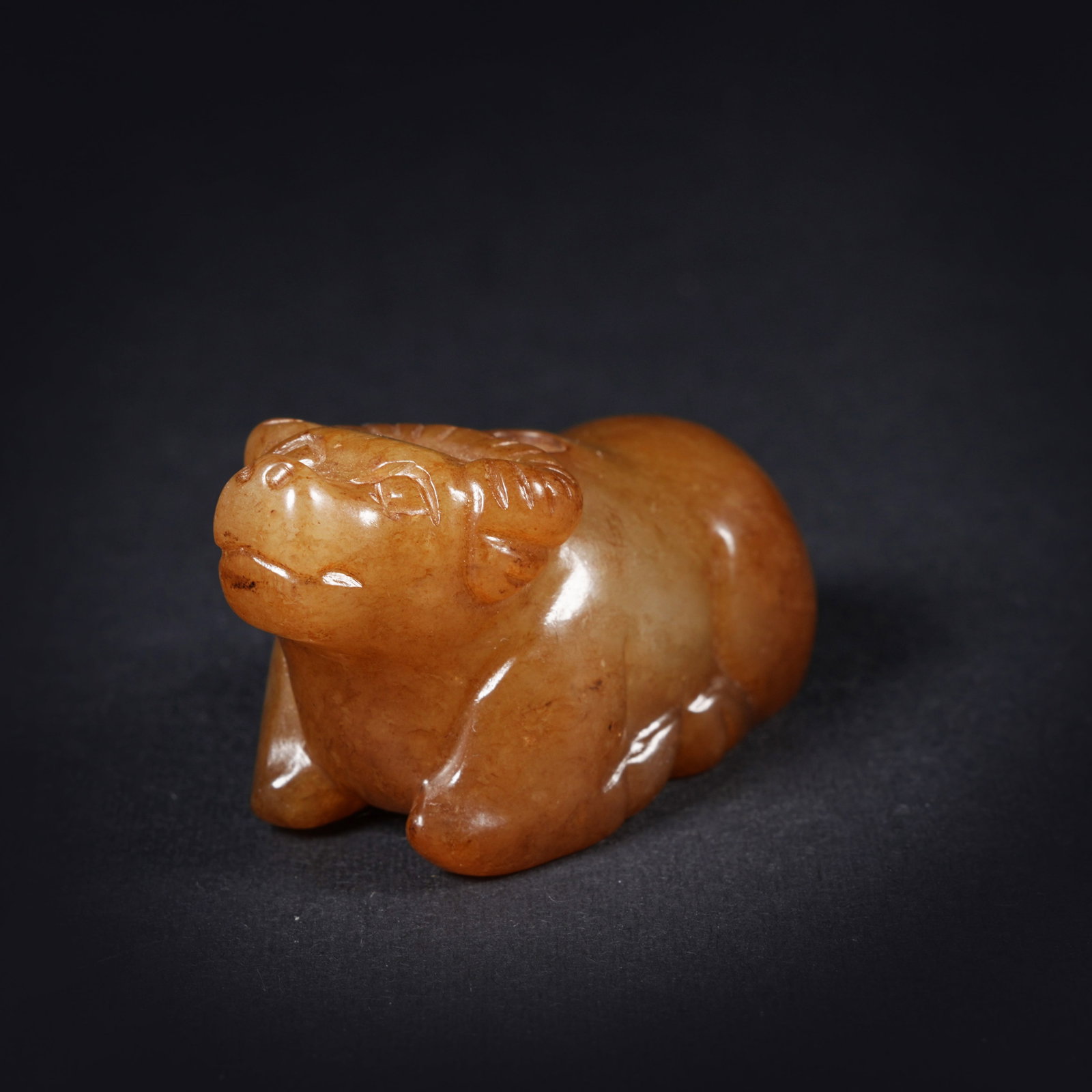 A HETIAN JADE OX PENDANT (1 of 9)
