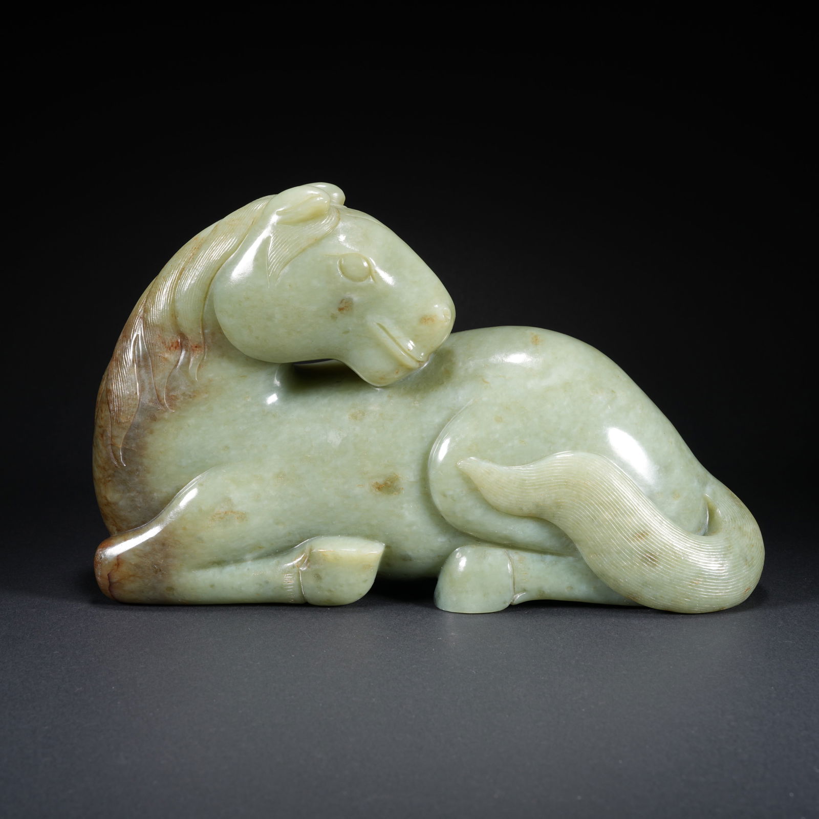 A HETIAN JADE CARVED HORSE-FORM FIGURE: Hetian Jade Carved Horse-Form Figure