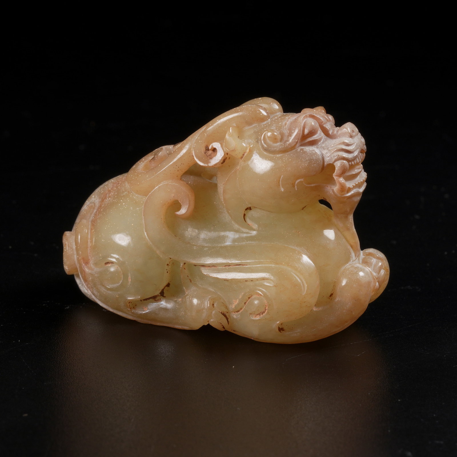 A ARCHAIC JADE AUSPICIOUS BEAST PENDANT: Archaic Jade Auspicious Beast Pendant