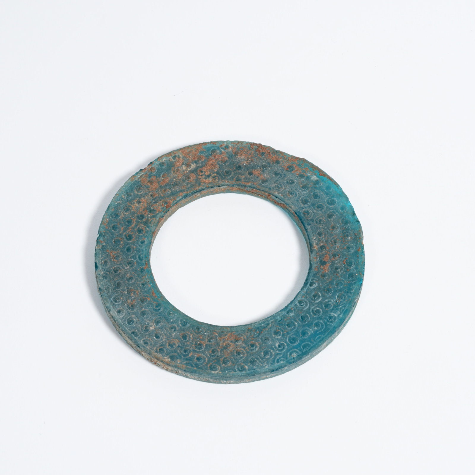 A COLORED-GLASS JADE BI DISC: Colored-glass jade bi disc