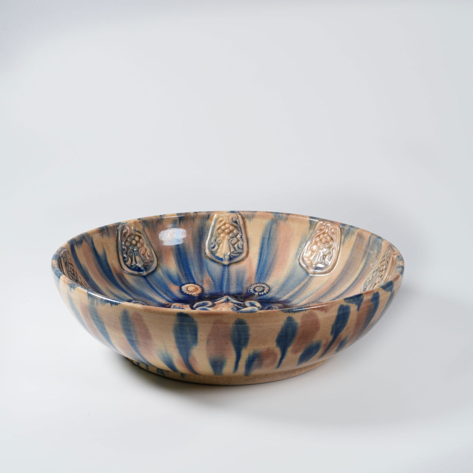 A HANGING-BLUE SANCAI-GLAZED BOWL: Hanging-blue sancai-glazed bowl