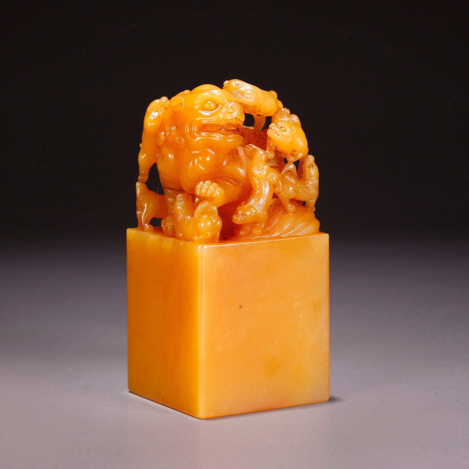 A SHOUSHAN TIANHUANG STONE SEAL WITH LARGE AND SMALL LION KNOBS: Shoushan Tianhuang Stone Seal with Large and Small Lion Knobs