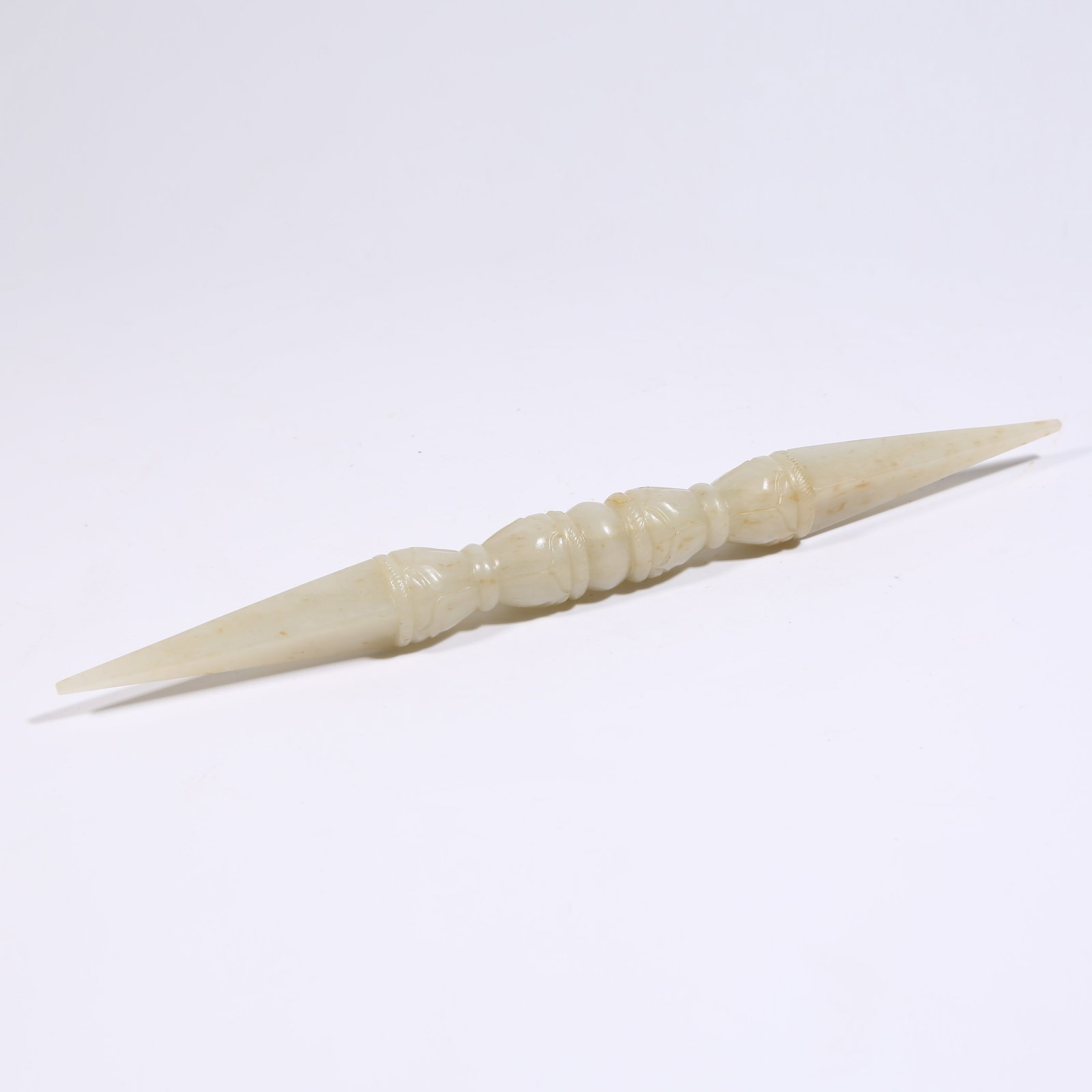 A HETIAN JADE VAJRA RITUAL IMPLEMENT: Hetian jade vajra ritual implement
