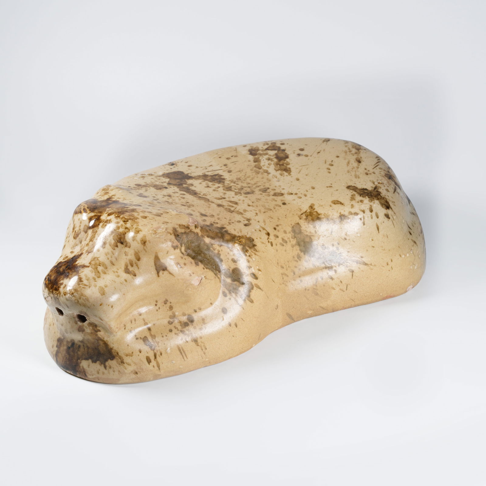 A OLD KILN TIGER-SHAPED PILLOW: Old kiln tiger-shaped pillow