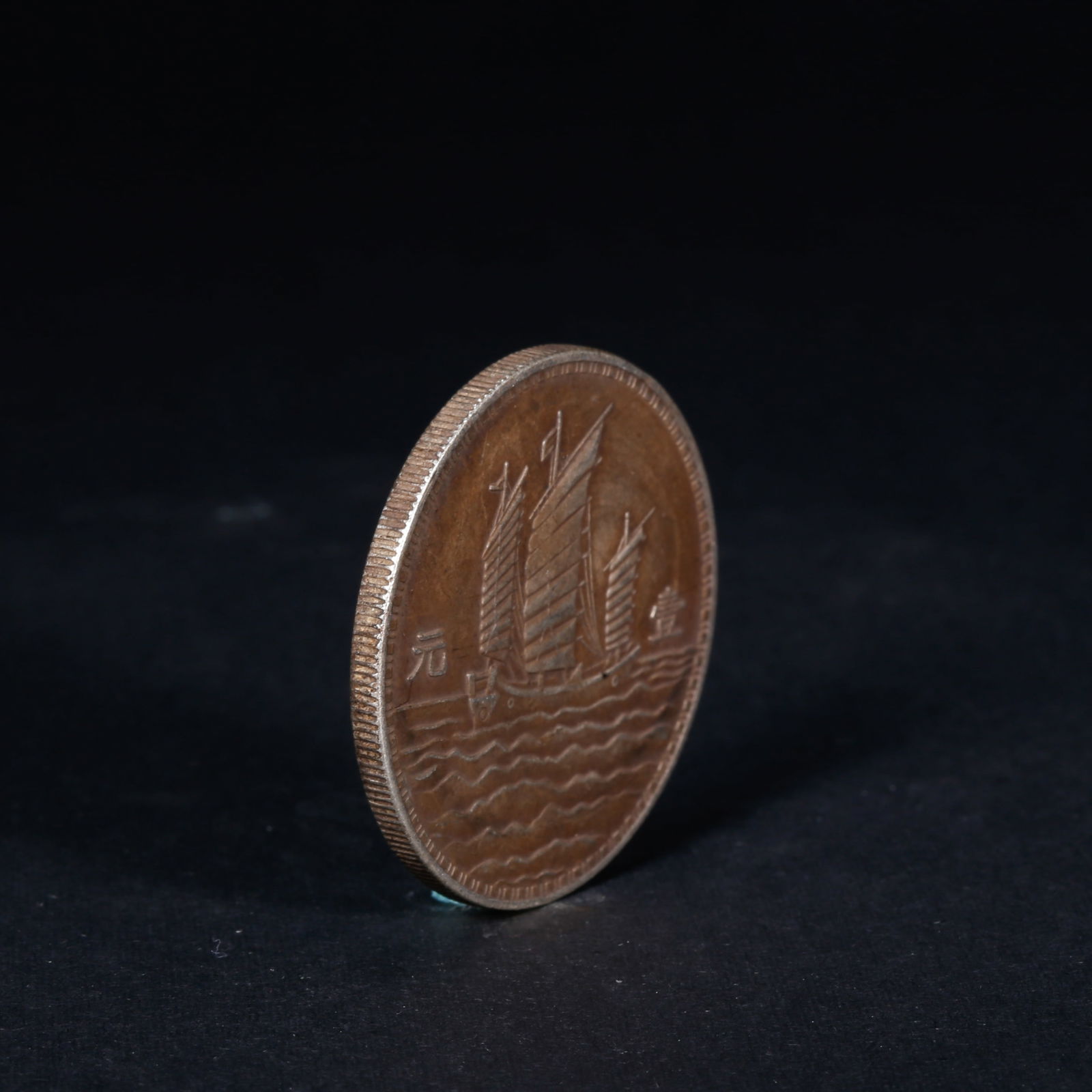 A SILVER DOLLAR COIN - 3