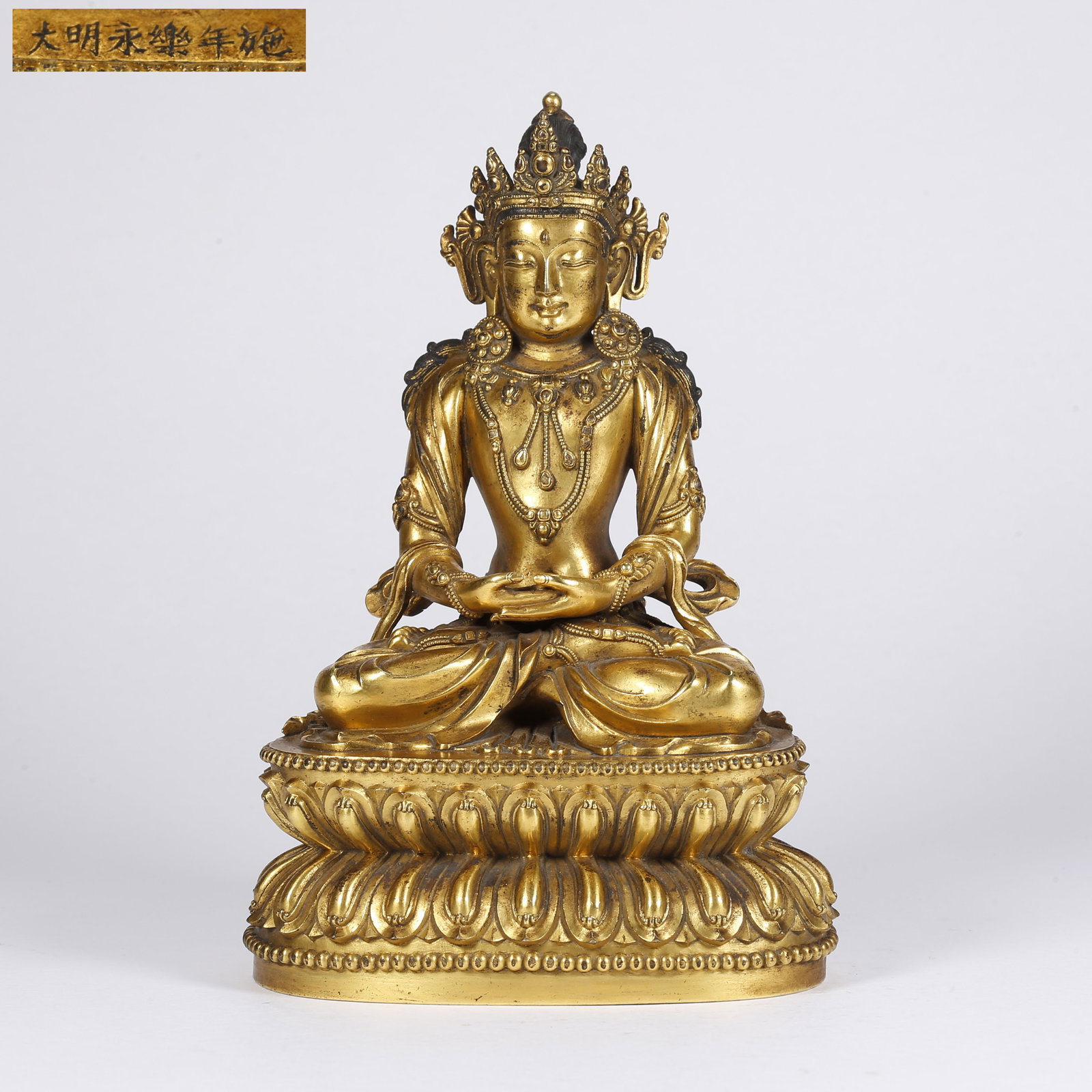 A GILT BRONZE SHAKYAMUNI WITH CROWN STATUE: Gilt Bronze Shakyamuni with Crown Statue