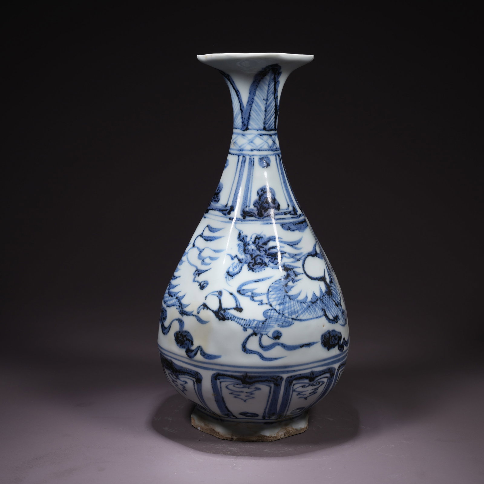 A BLUE-AND-WHITE ZUN VASE WITH CLOUD AND DRAGON MOTIF AND PHOENIX-TAIL FORM: Blue-and-White Zun Vase with Cloud and Dragon Motif and Phoenix-Tail Form