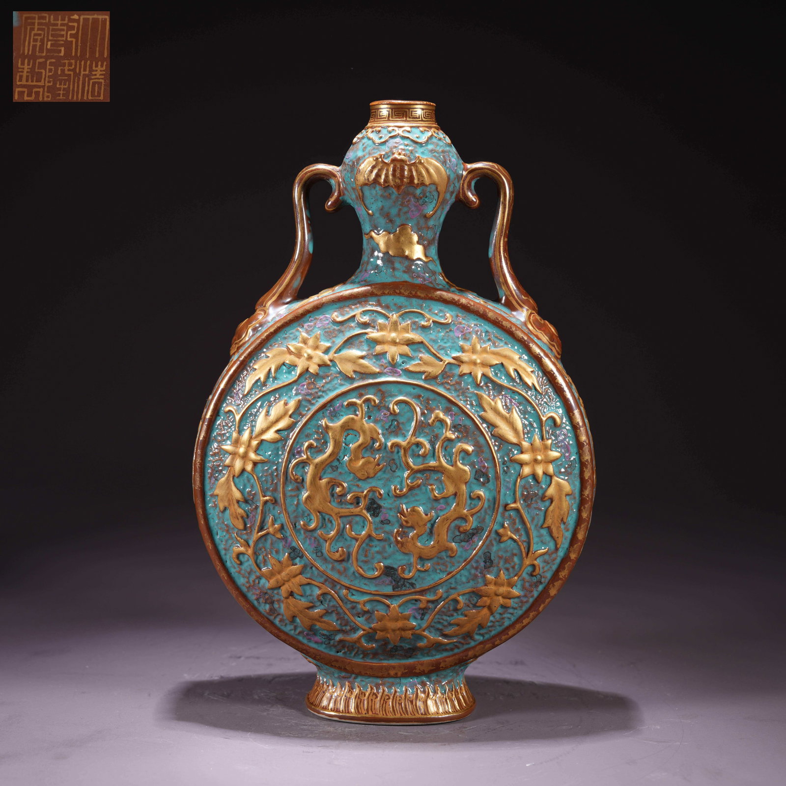 A ANCIENT BRONZE MOON-FLASK WITH WEALTH RIBBON HANDLES: Ancient Bronze Moon-Flask with Wealth Ribbon Handles