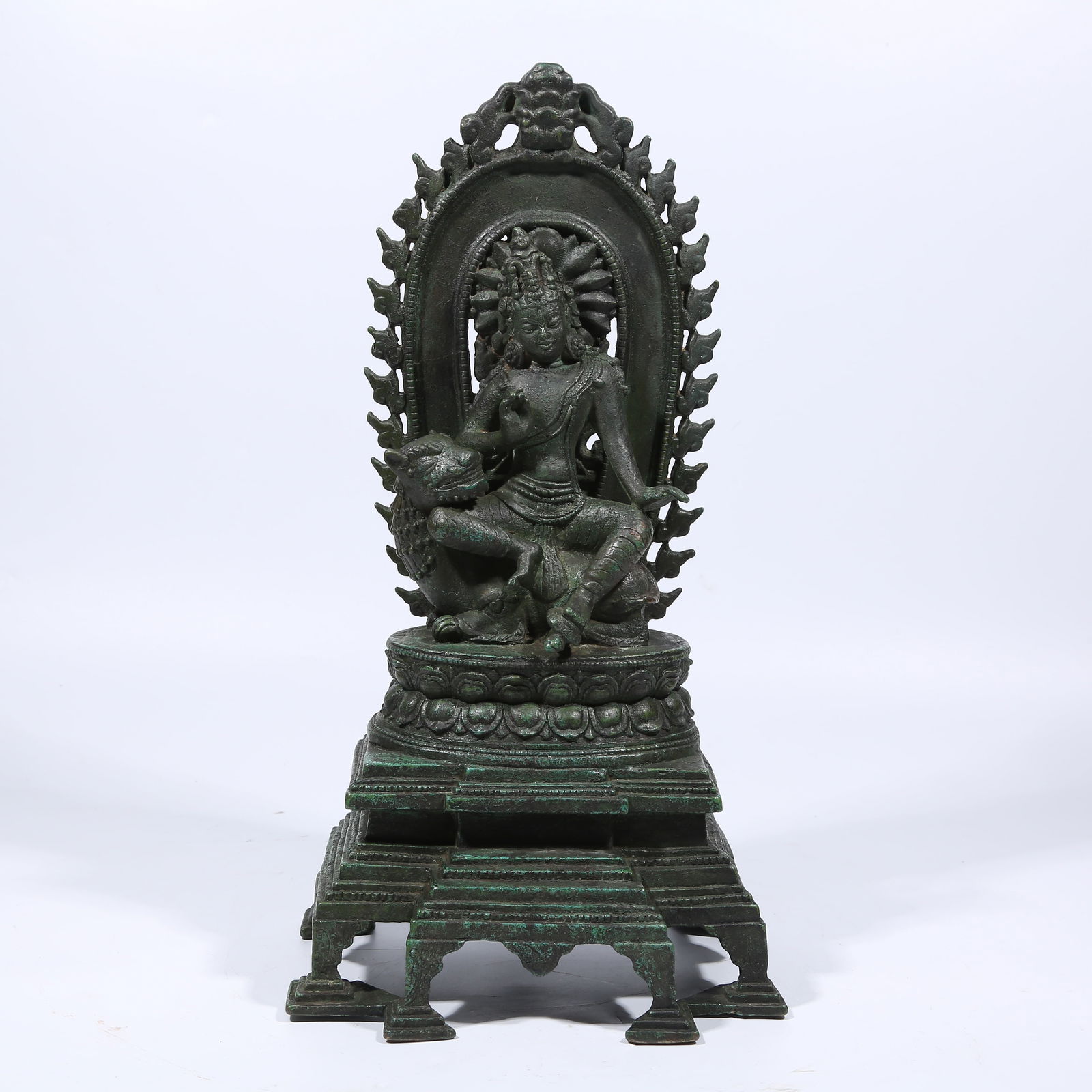 A BRONZE LION'S ROAR AVALOKITESHVARA STATUE: Bronze Lion's Roar Avalokiteshvara Statue