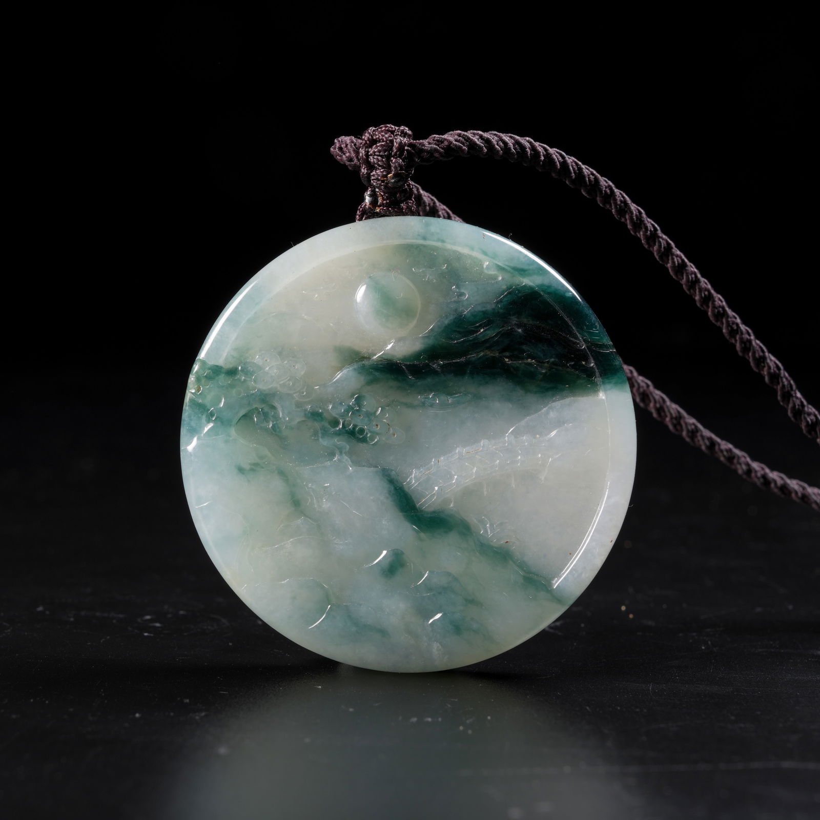 A JADEITE LANDSCAPE-PATTERN PLAQUE: Jadeite Landscape-Pattern Plaque