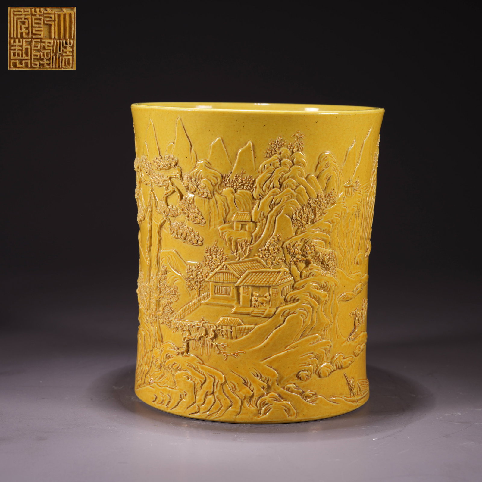 A LEMON-YELLOW GLAZED CARVED PORCELAIN BRUSH HOLDER WITH LANDSCAPE MOTIF: Lemon-Yellow Glazed Carved Porcelain Brush Holder with Landscape Motif