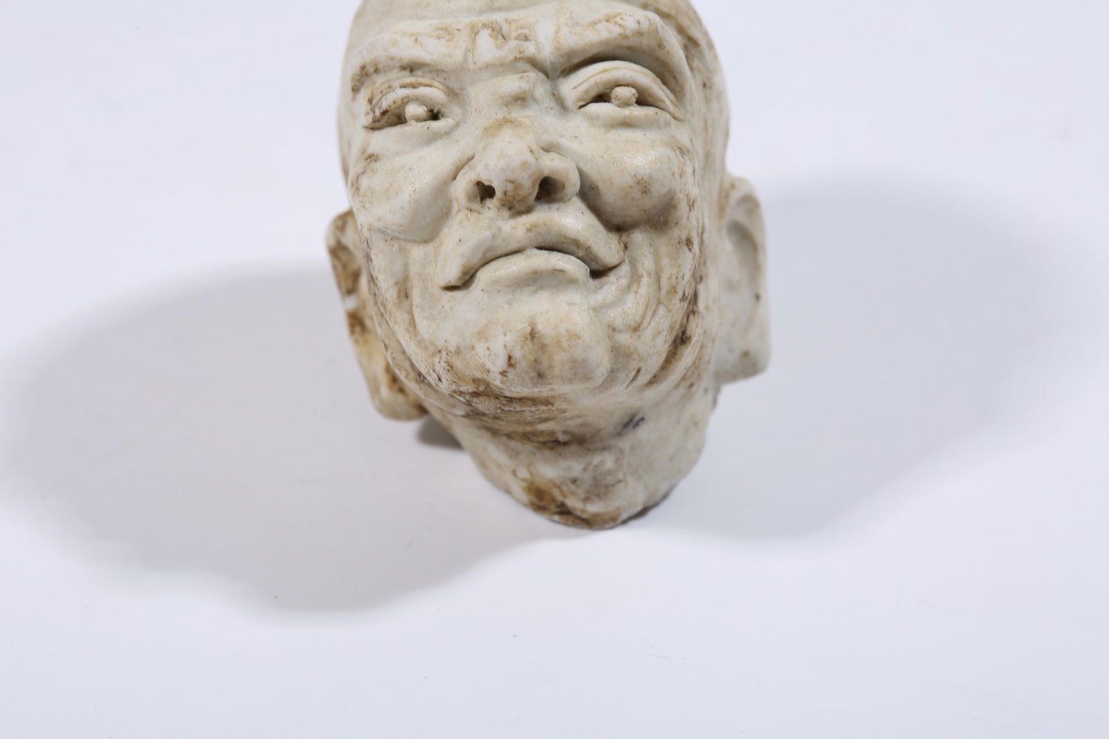 A REVERSE-PAINTED PORCELAIN LUOHAN HEAD - 6