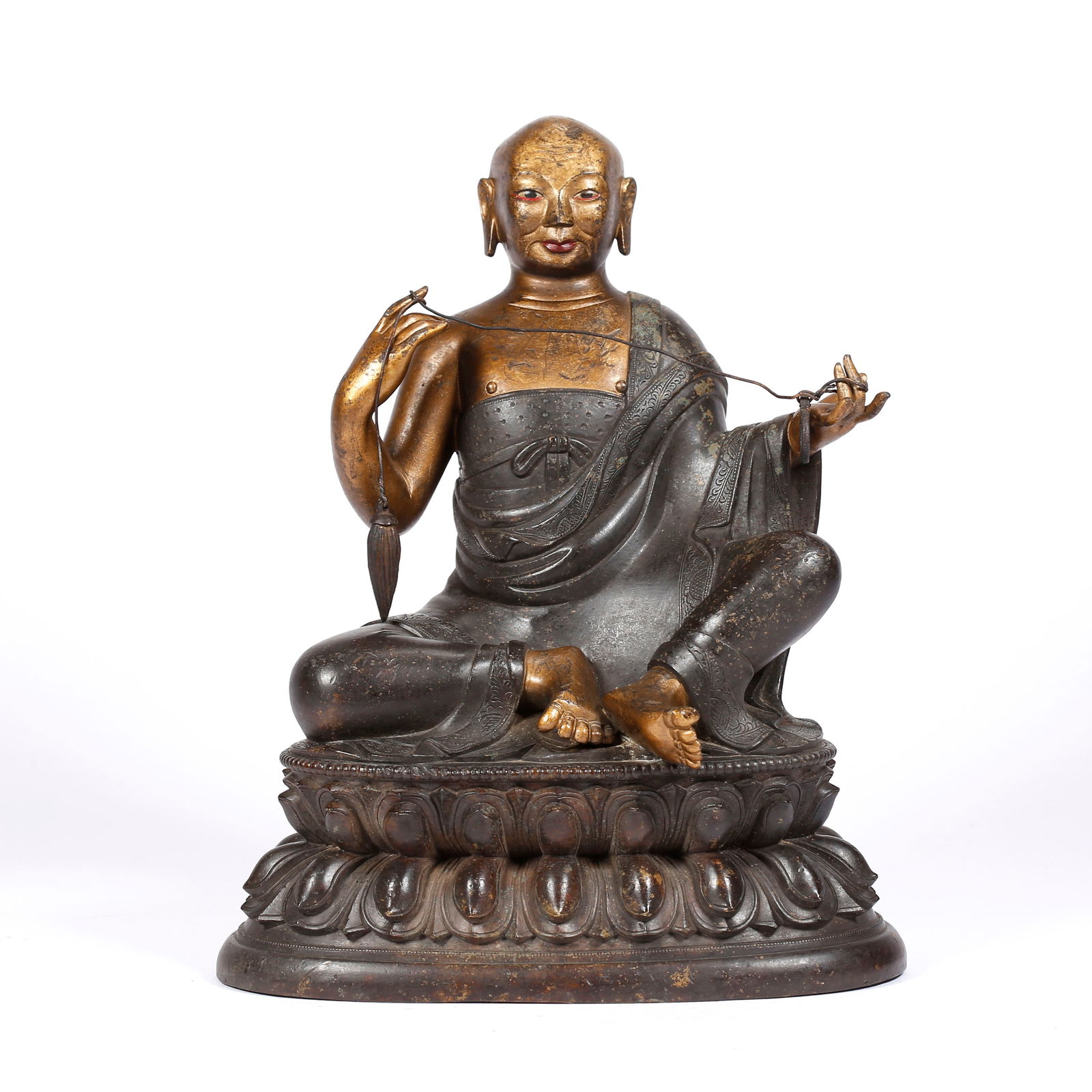 A GILT BRONZE LAMA STATUE: Gilt Bronze Lama Statue