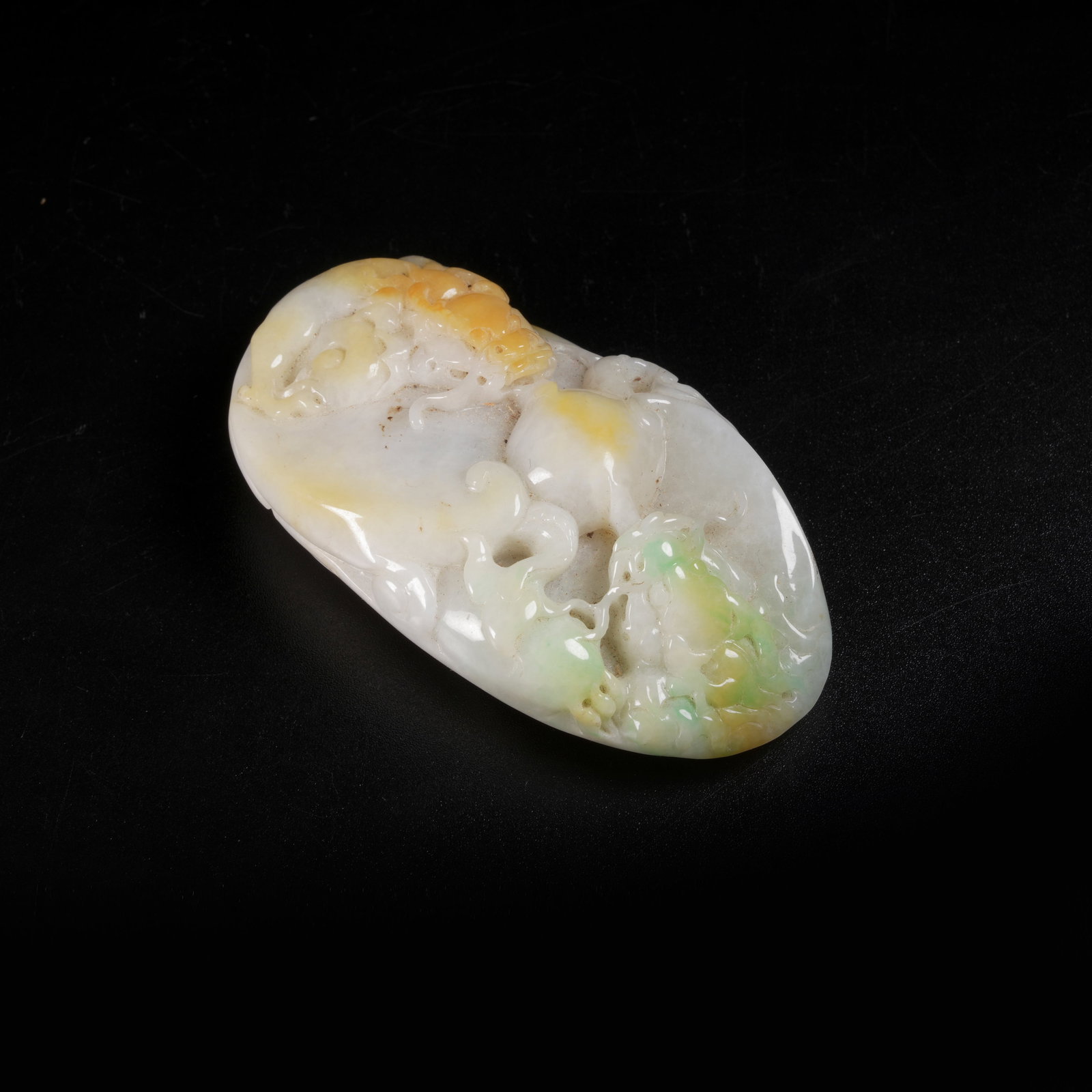 A JADEITE DOUBLE-DRAGON PLAYING WITH PEARL PENDANT: Jadeite Double-Dragon Playing with Pearl Pendant